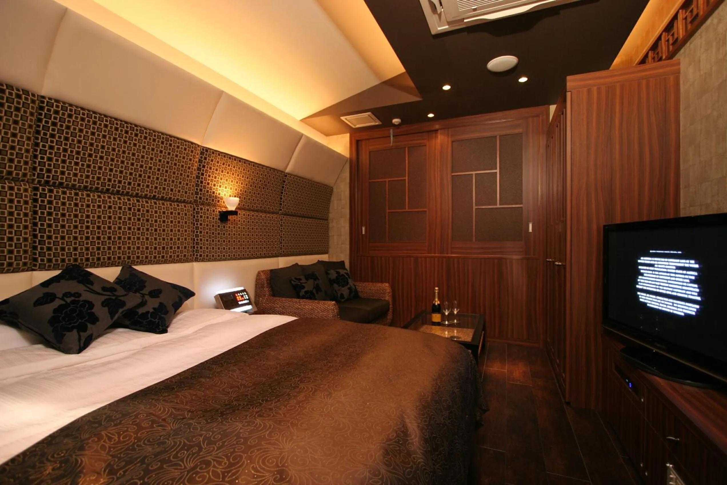 Bed in HOTEL W-PREMIUM -W GROUP HOTELS and RESORTS-