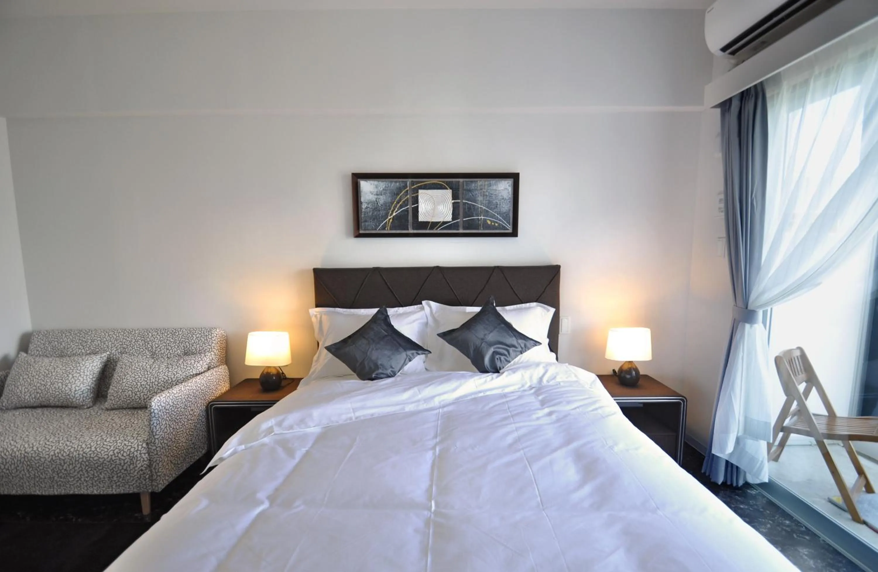 Bed in Beach Front Tower Mihama by DSH