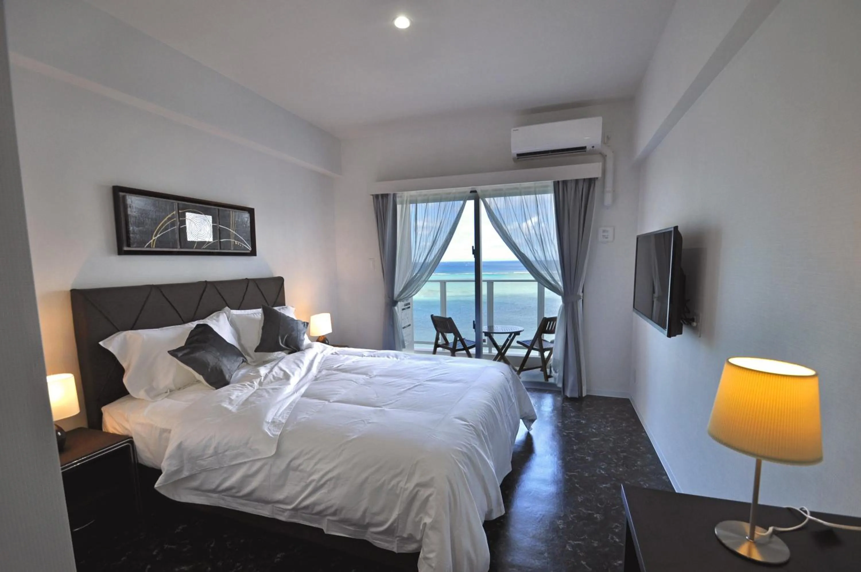 Photo of the whole room, Bed in Beach Front Tower Mihama by DSH