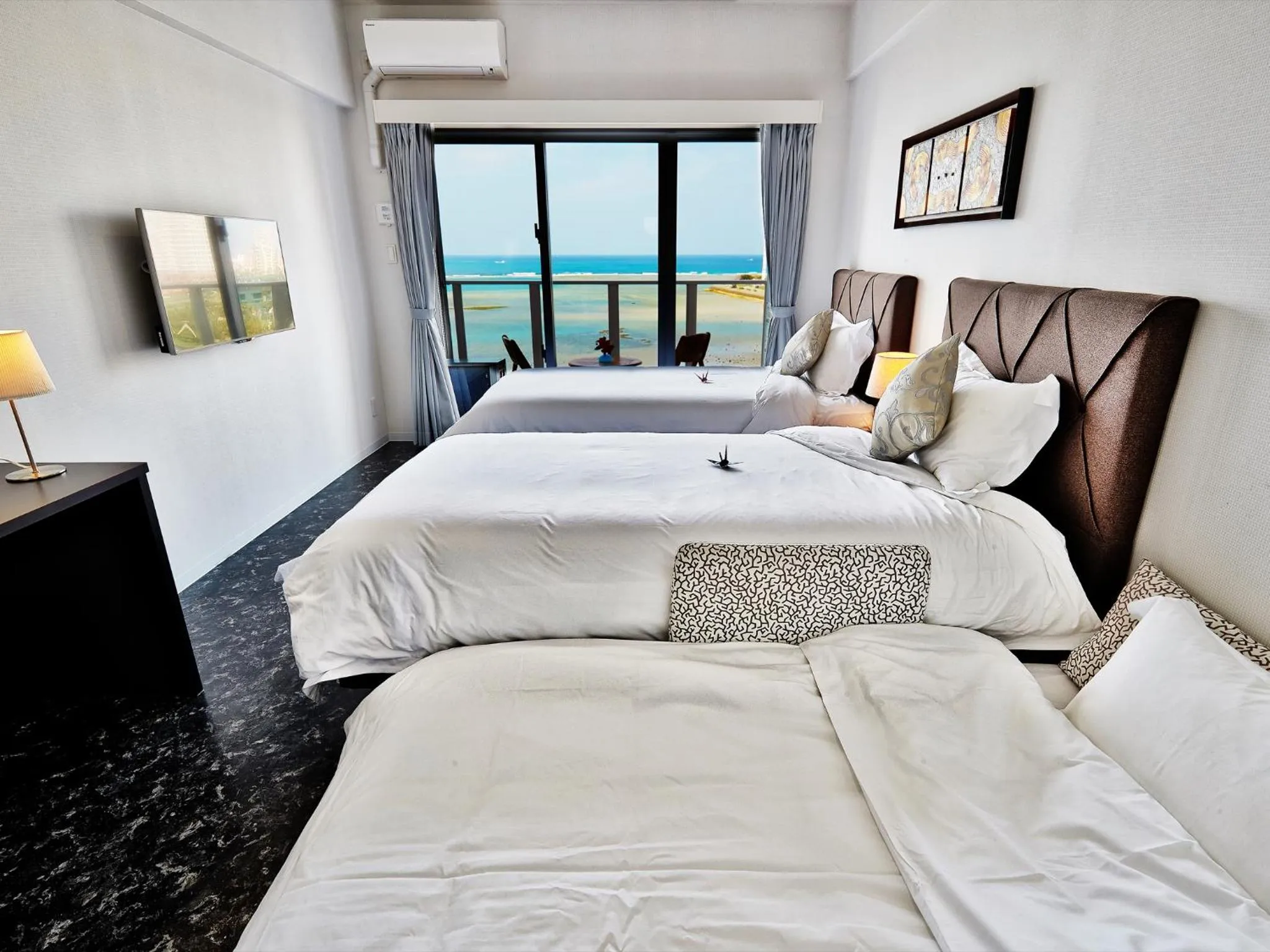 Photo of the whole room, Bed in Beach Front Tower Mihama by DSH