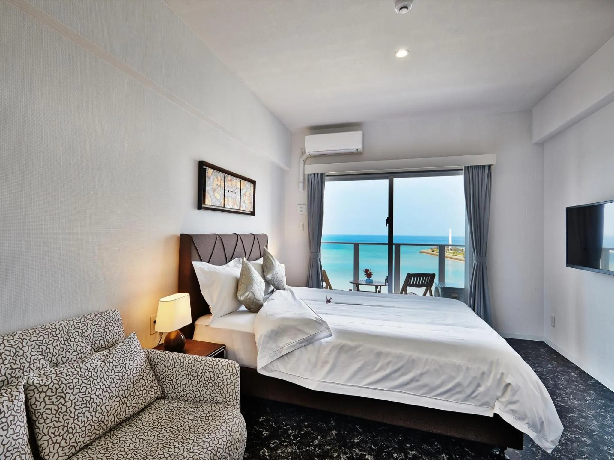 Photo of the whole room, Bed in Beach Front Tower Mihama by DSH