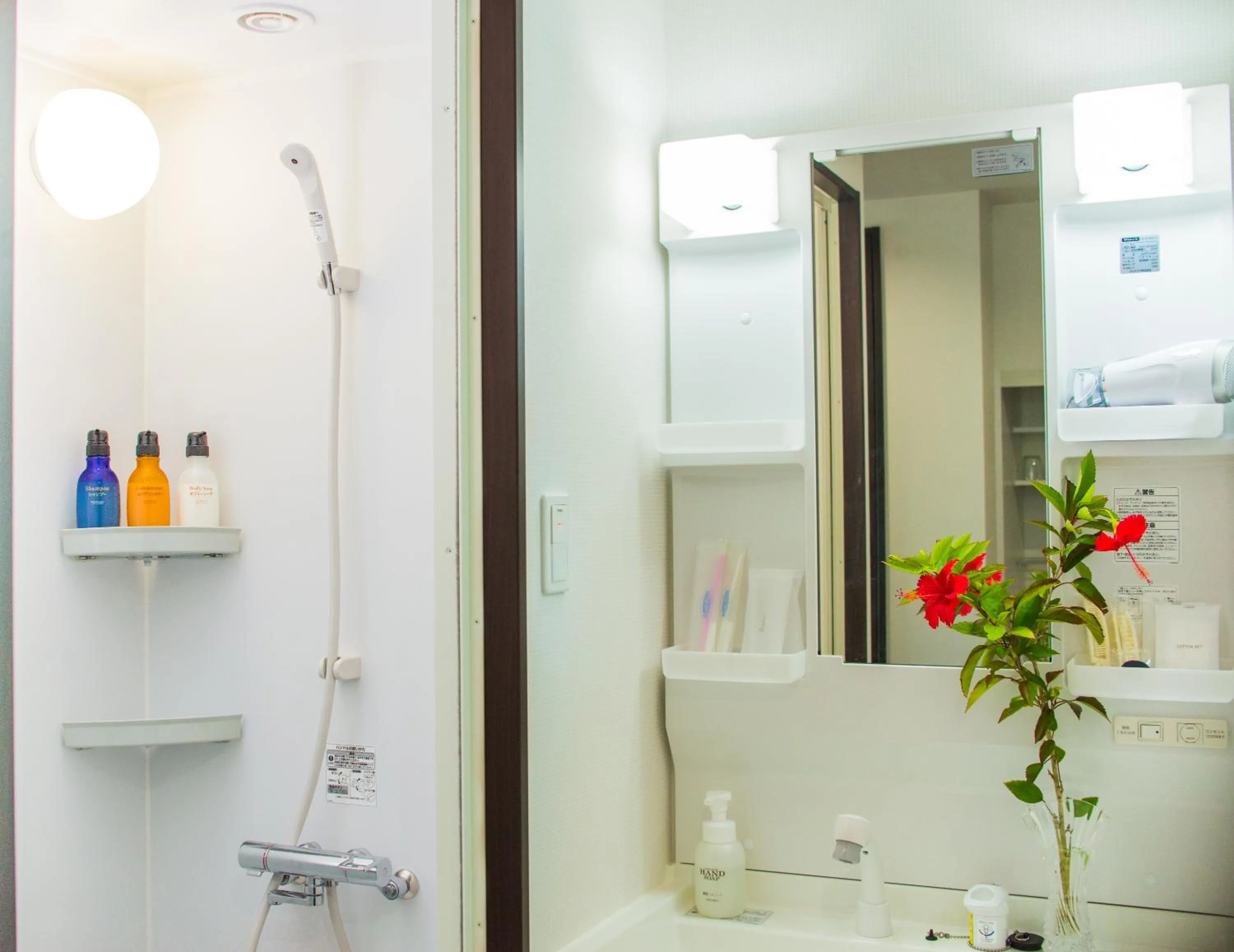 Shower in Beach Front Tower Mihama by DSH