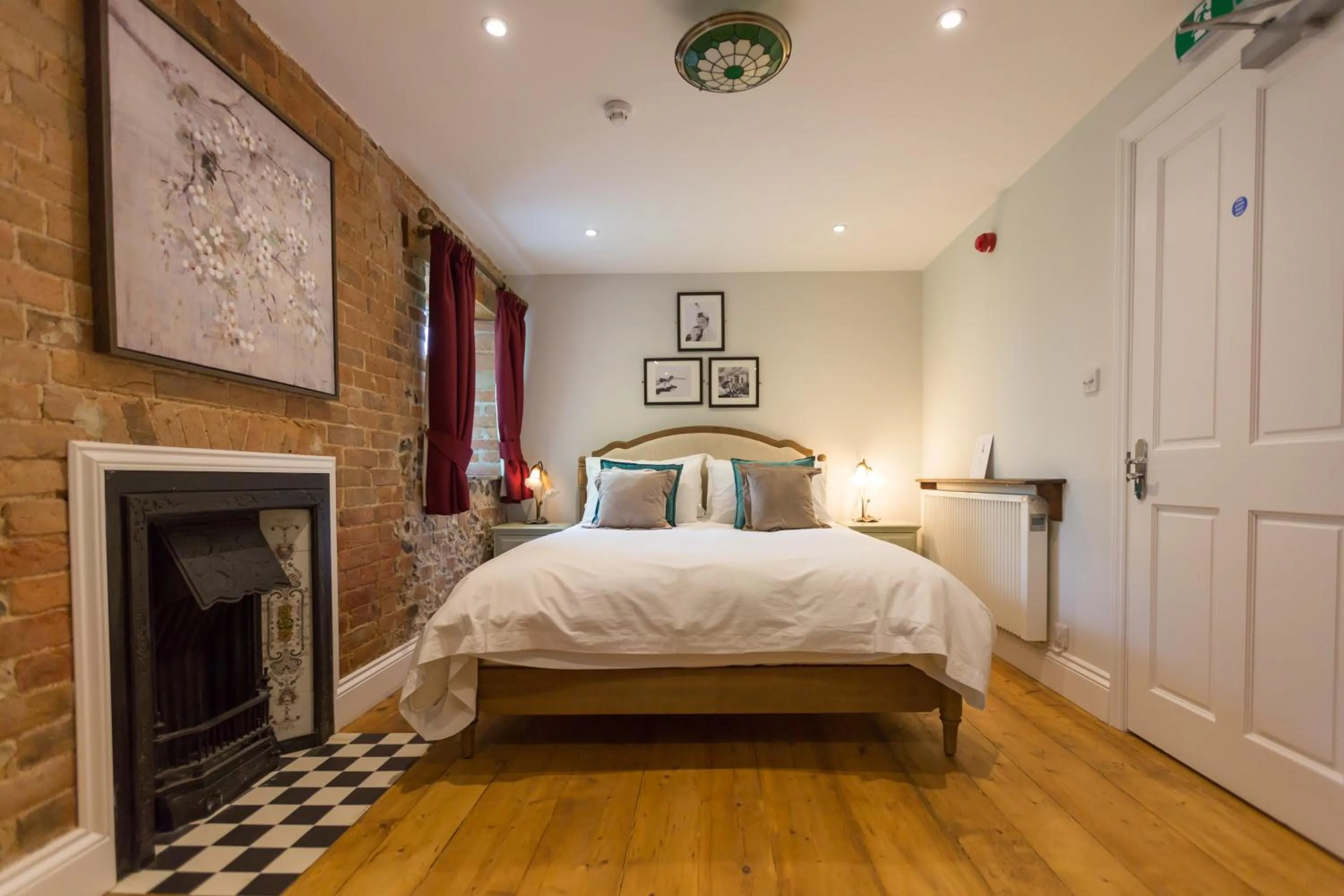 Bed in The Dog & Gun Inn