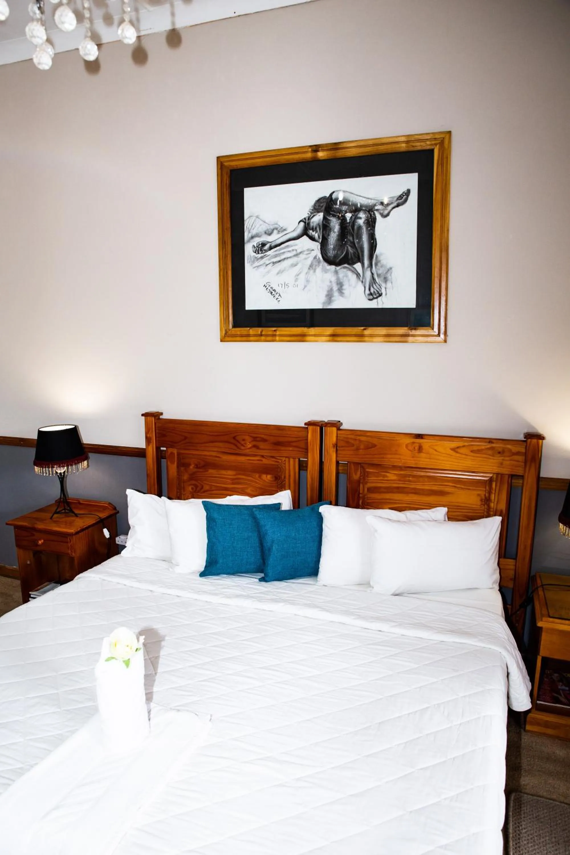 Bed in Woodpecker Guesthouse