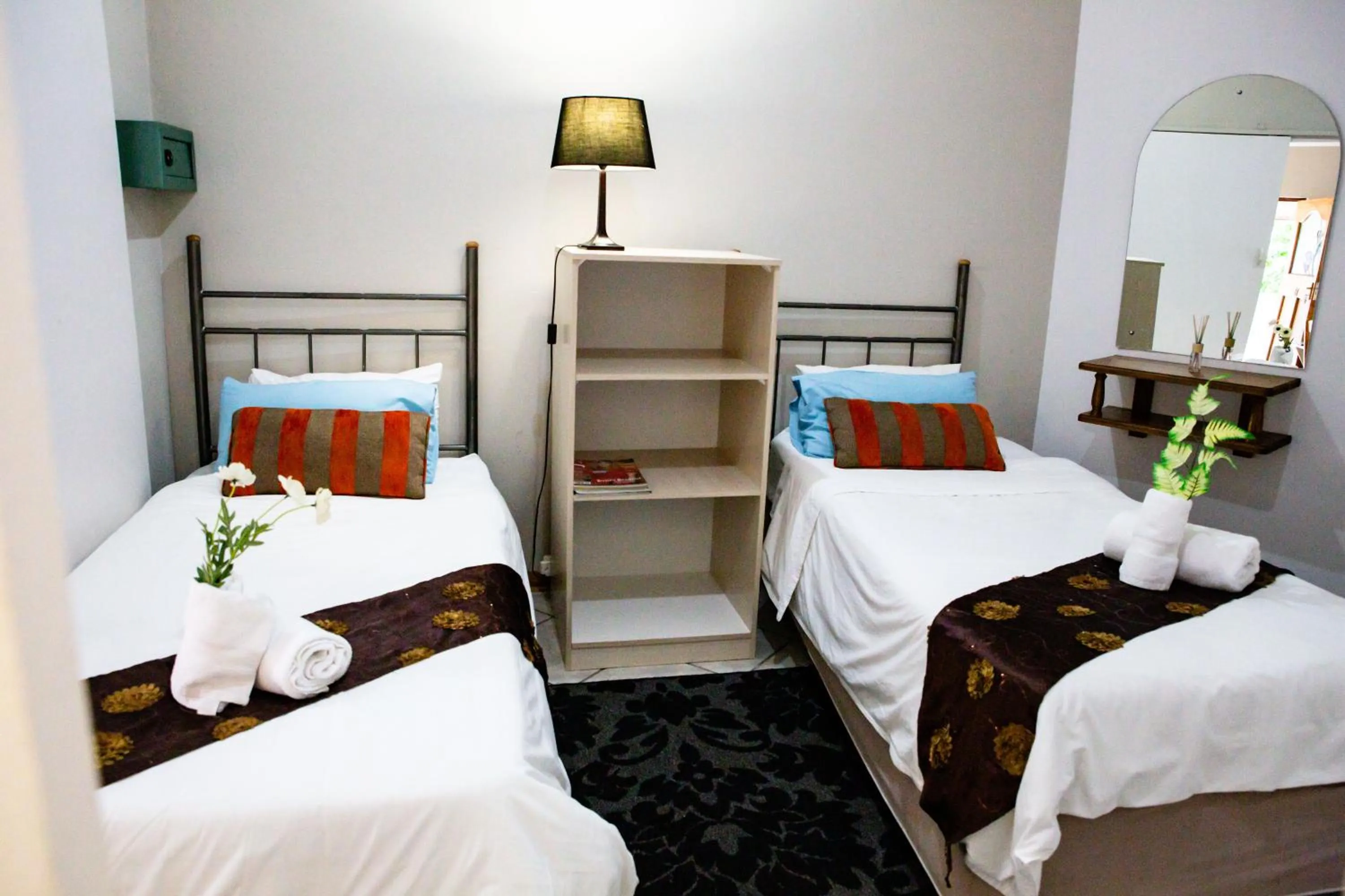 Bed in Woodpecker Guesthouse