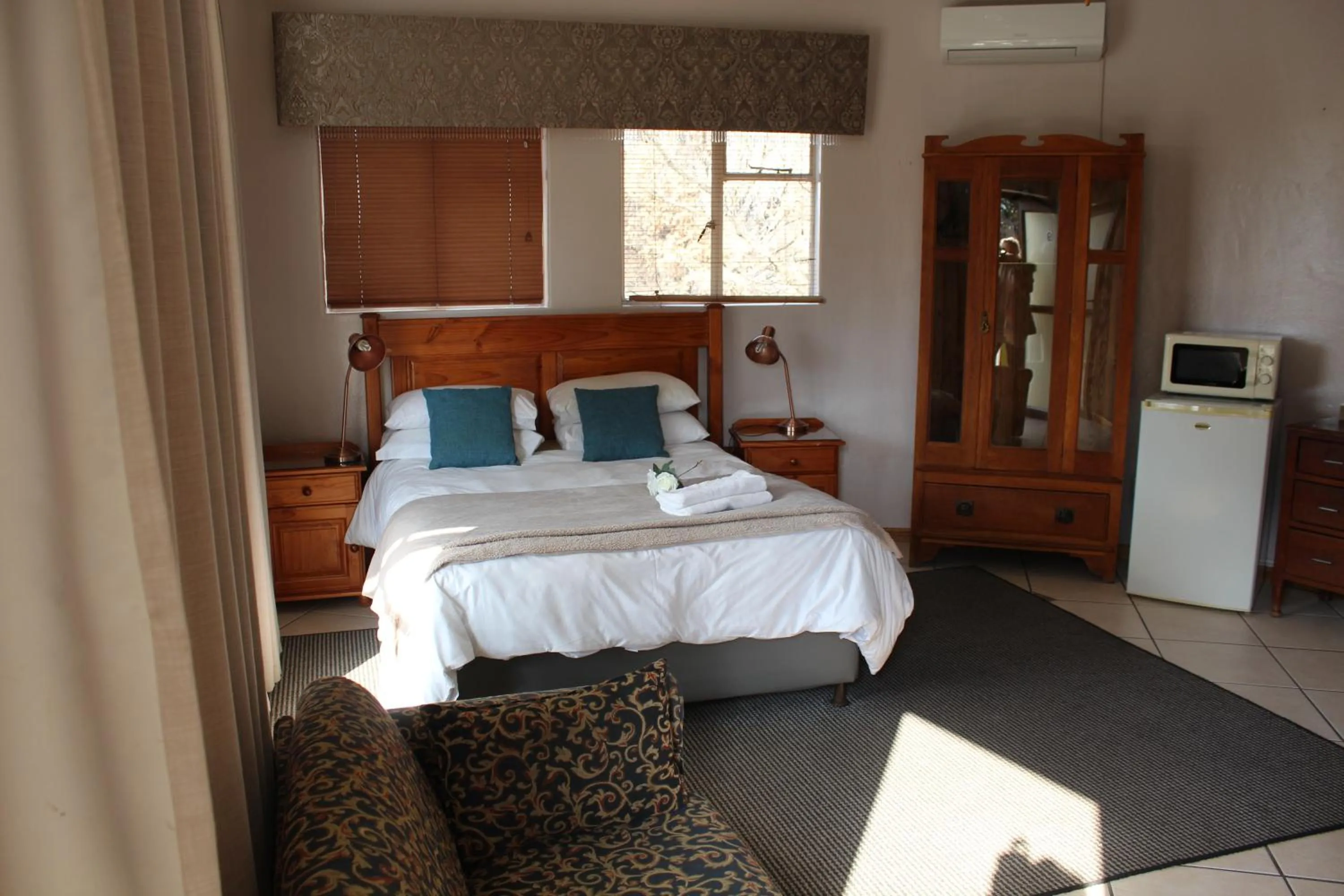 Bed in Woodpecker Guesthouse