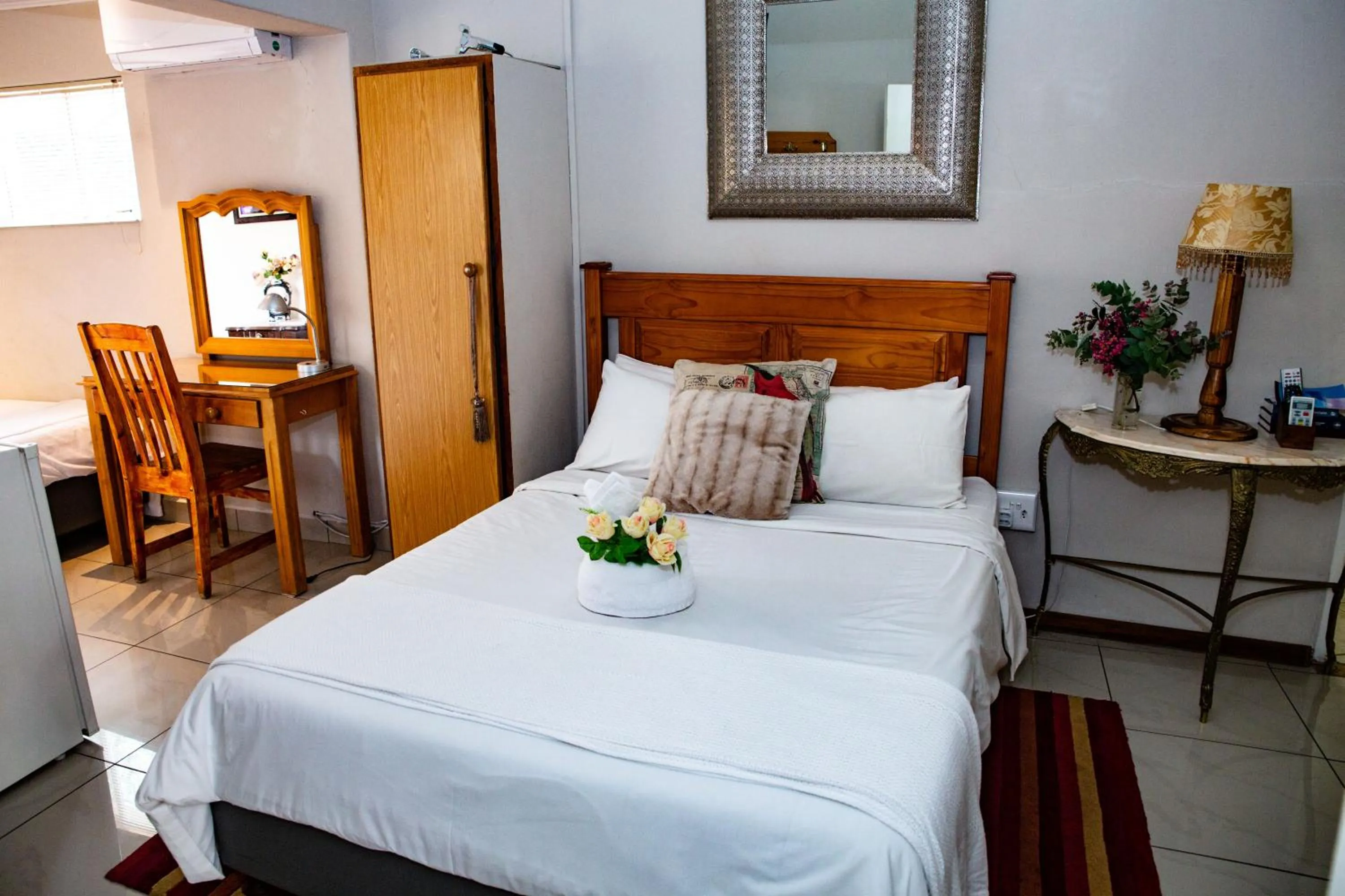 Bed in Woodpecker Guesthouse