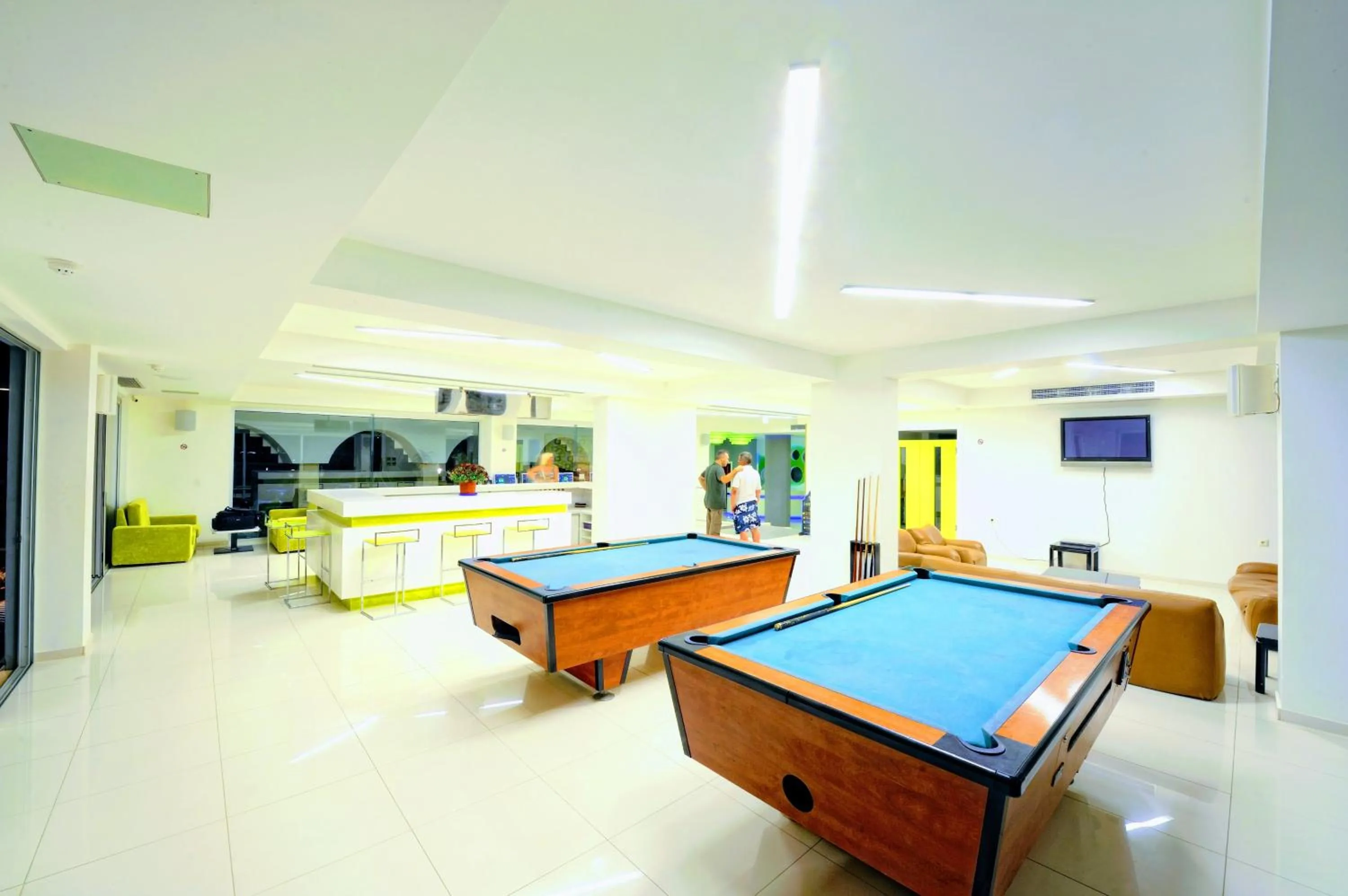 Communal lounge/ TV room in Hermes Hotel