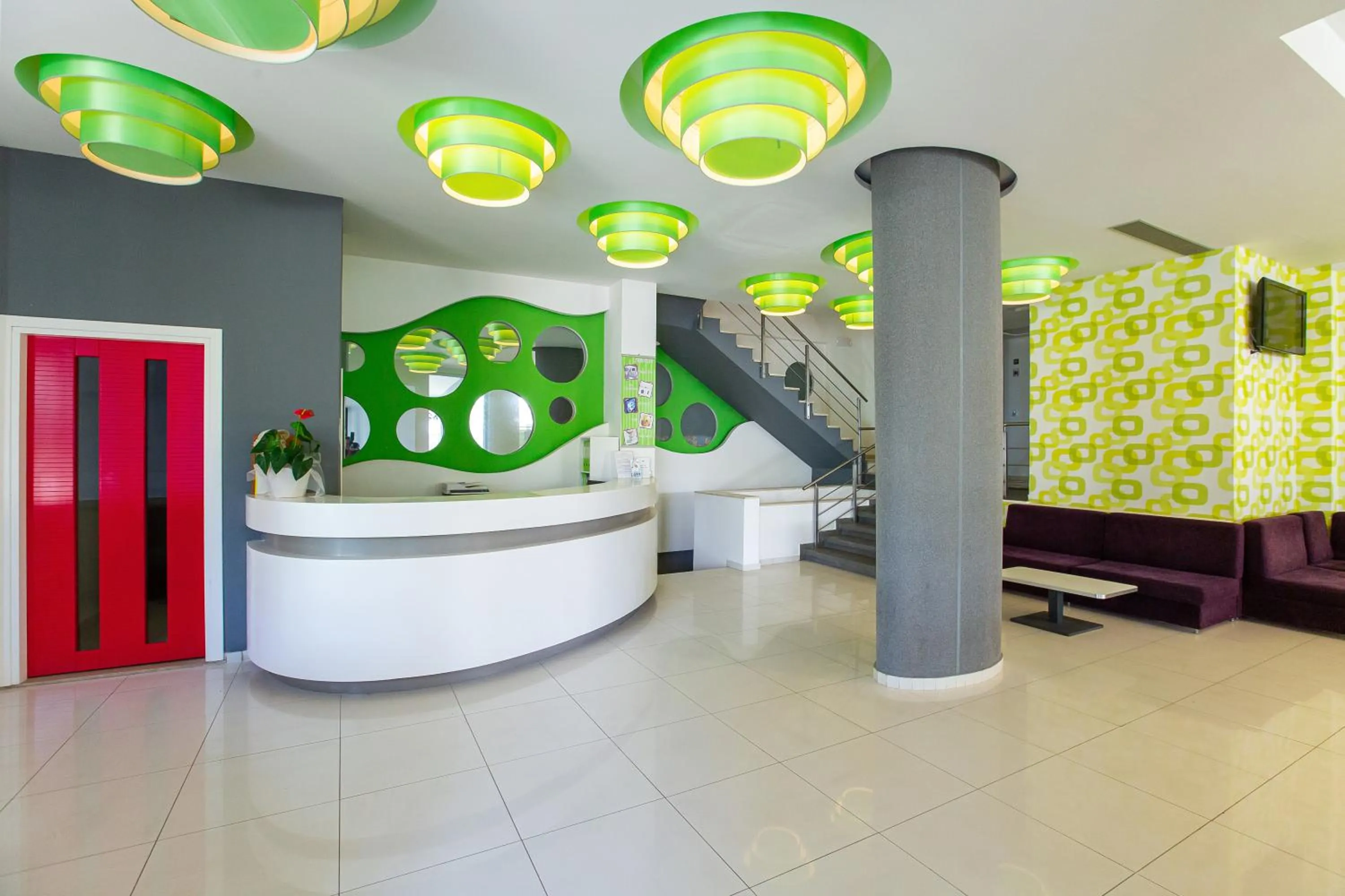 Communal lounge/ TV room in Hermes Hotel