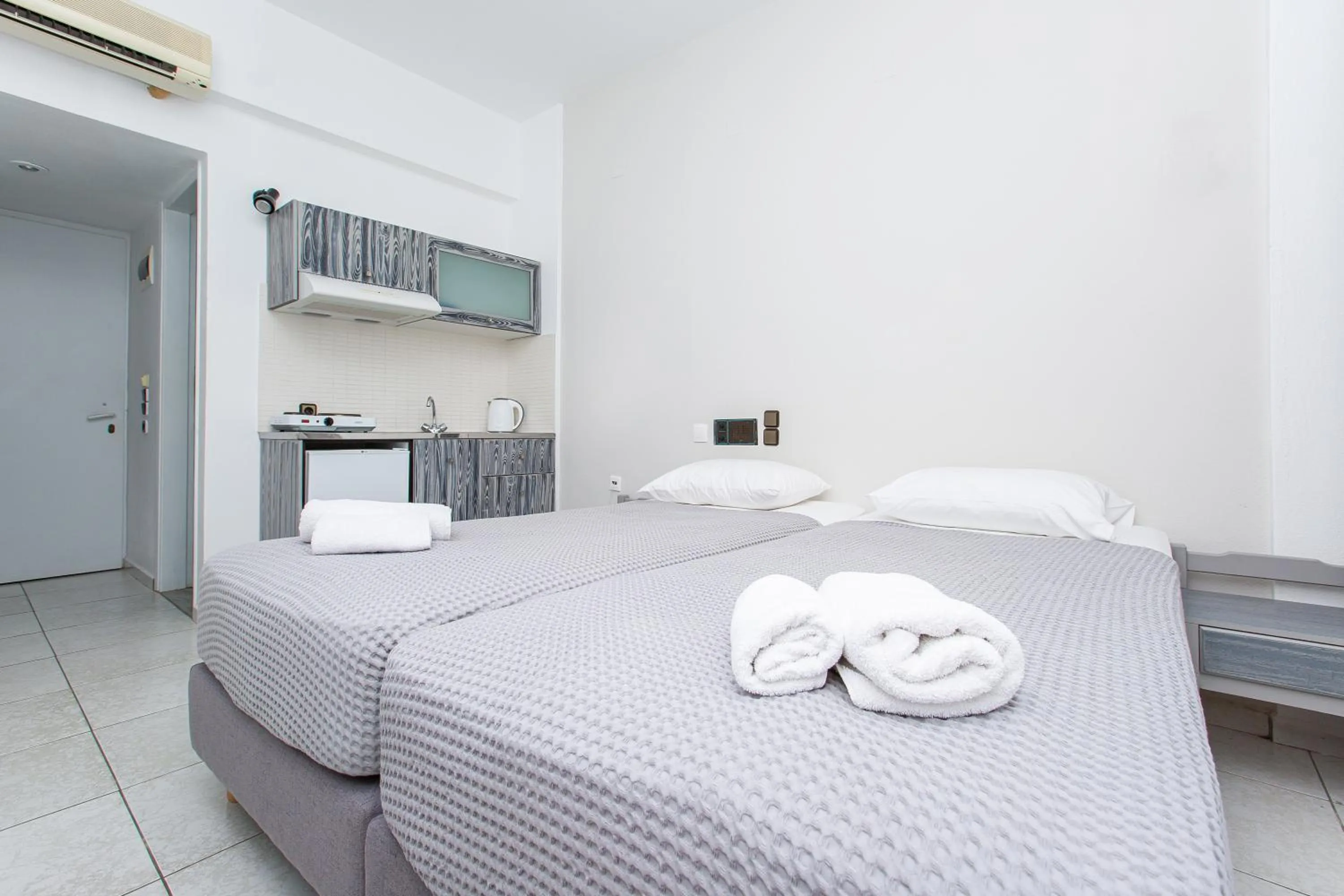 Kitchen or kitchenette, Bed in Hermes Hotel