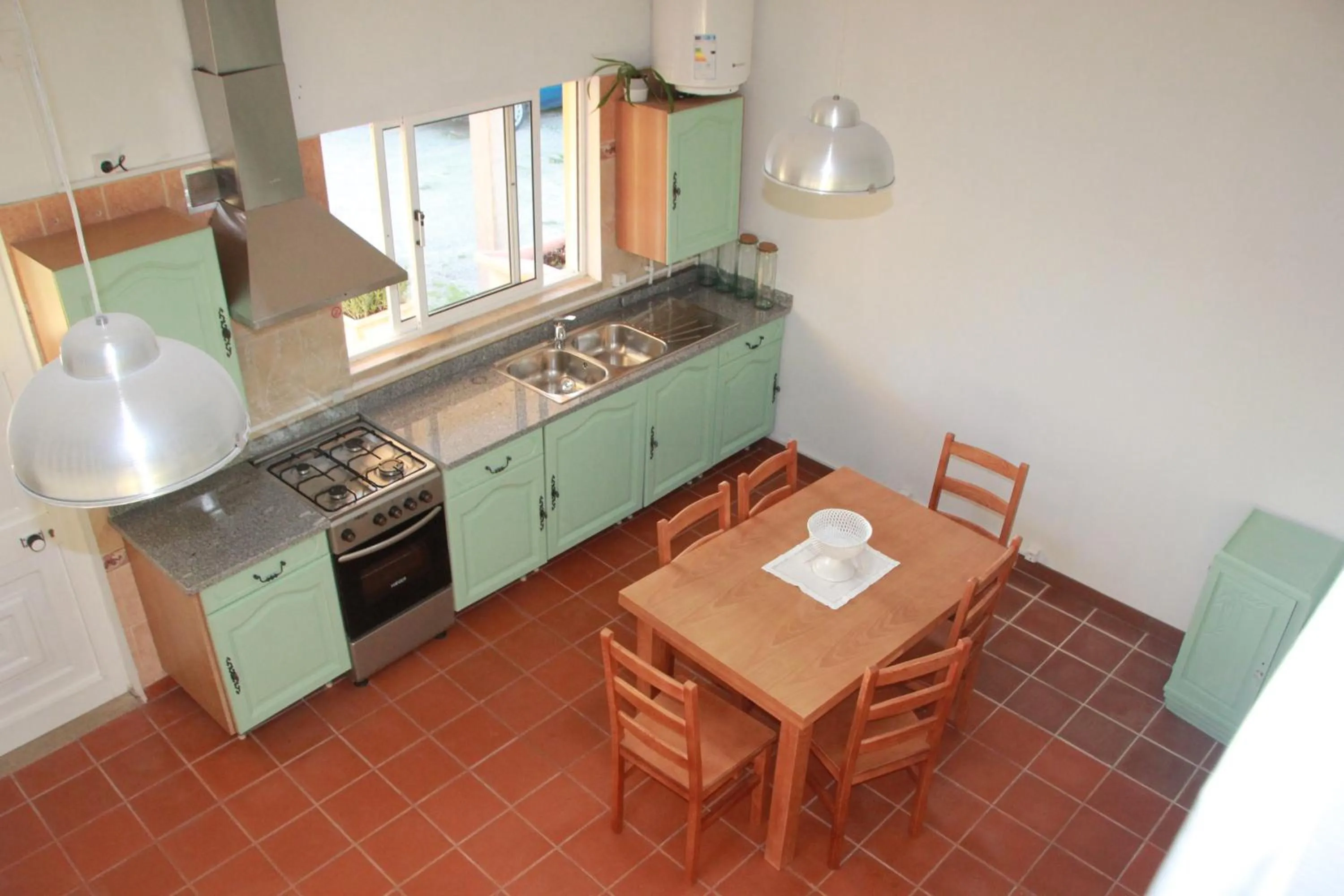 Kitchen or kitchenette in Quartos em vivenda serra da Estrela