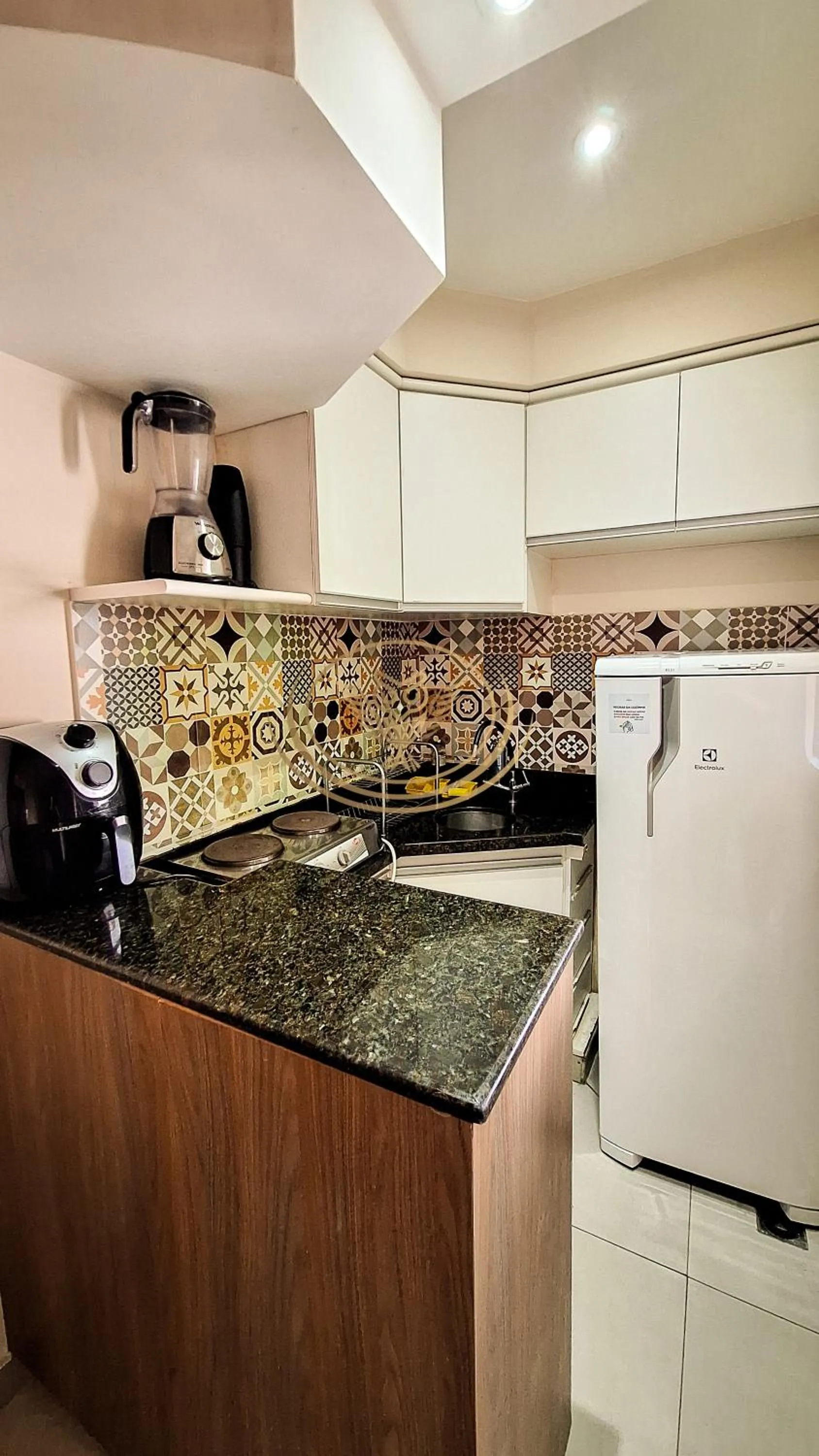 Communal kitchen in Coruja Imob - Flat Crystal Place