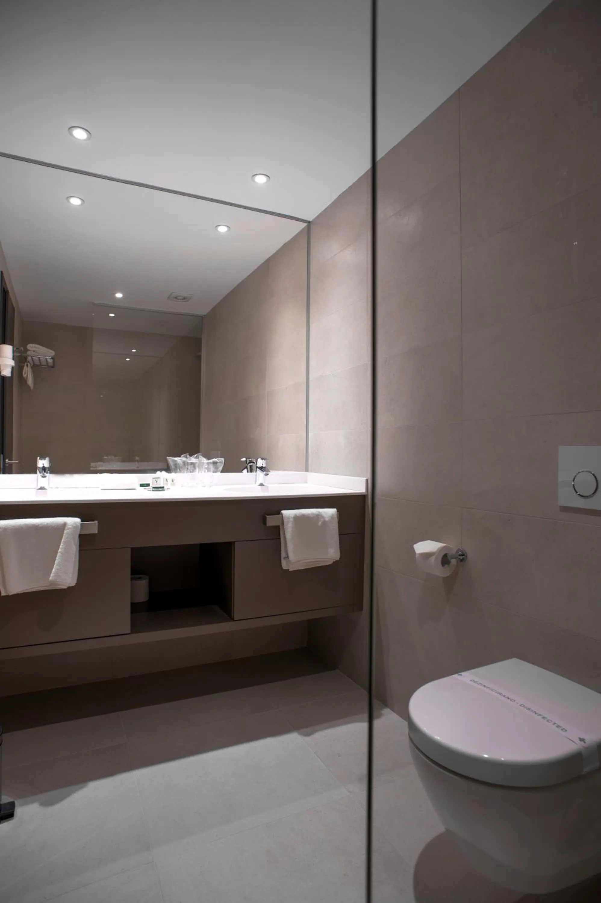 Bathroom in voco - Podgorica by IHG