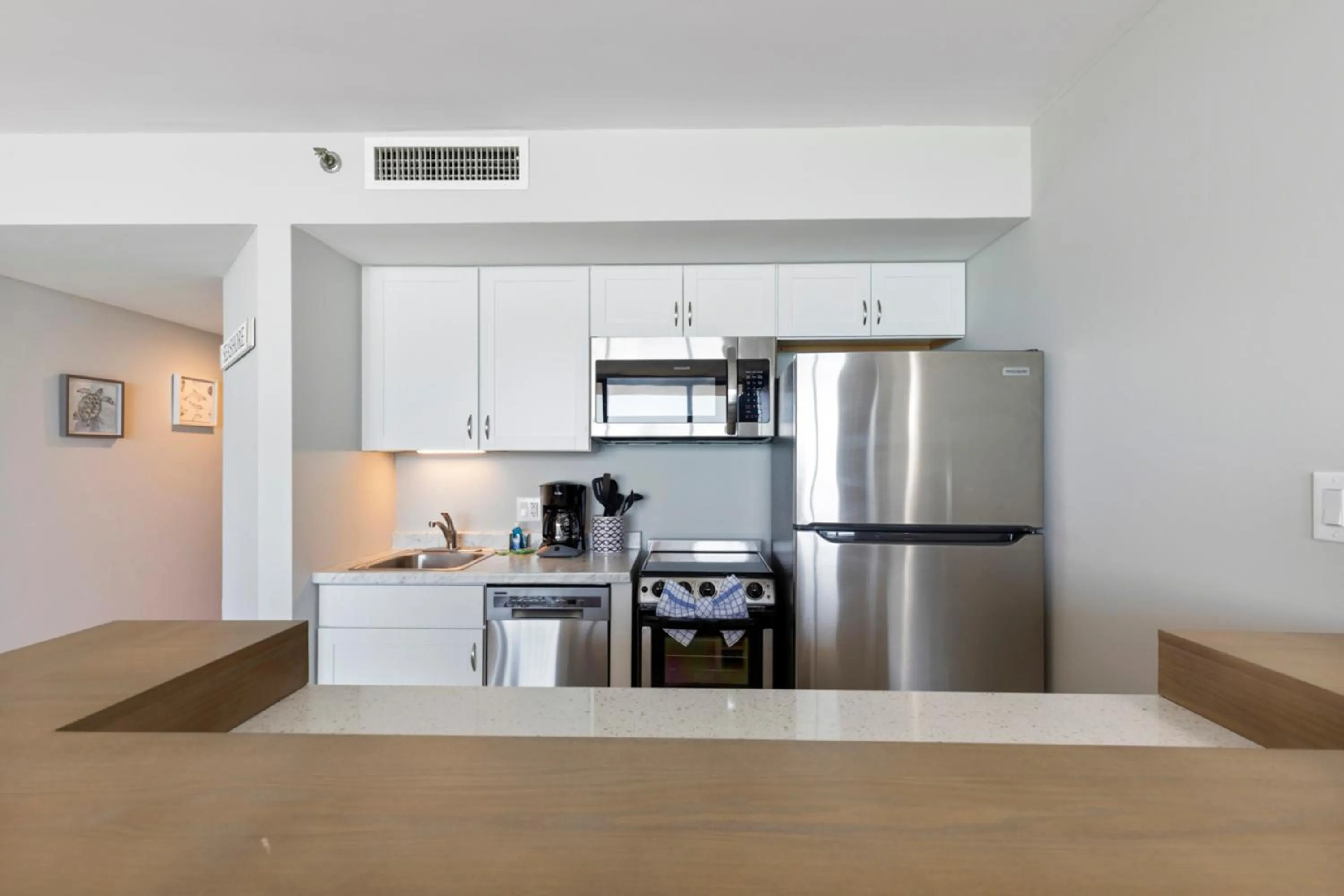 Kitchen or kitchenette in Scenic Views from the balcony at Ocean Forest Plaza Condos