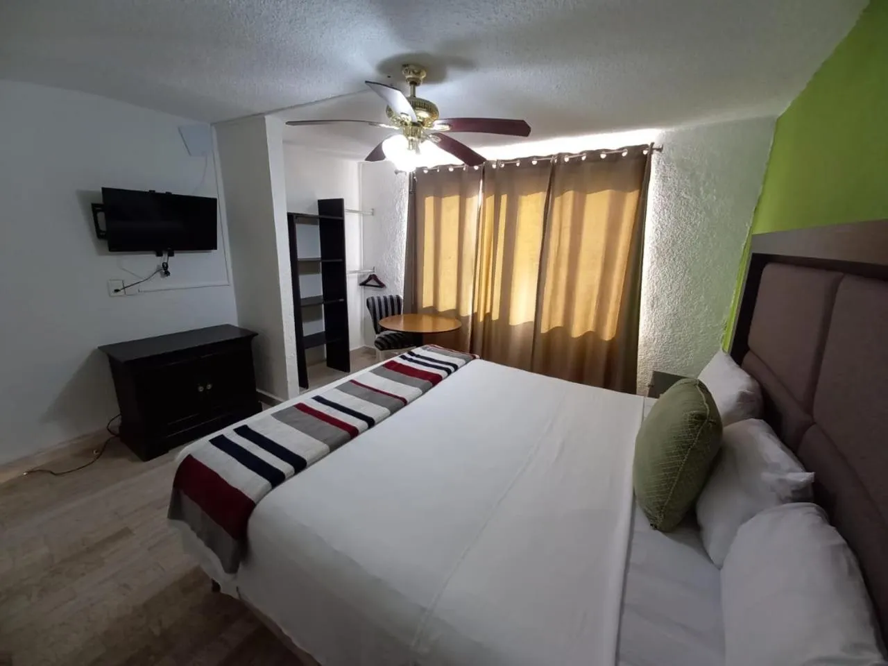 Photo of the whole room, Bed in Nirvana Hotel - Cancun Hotel Zone