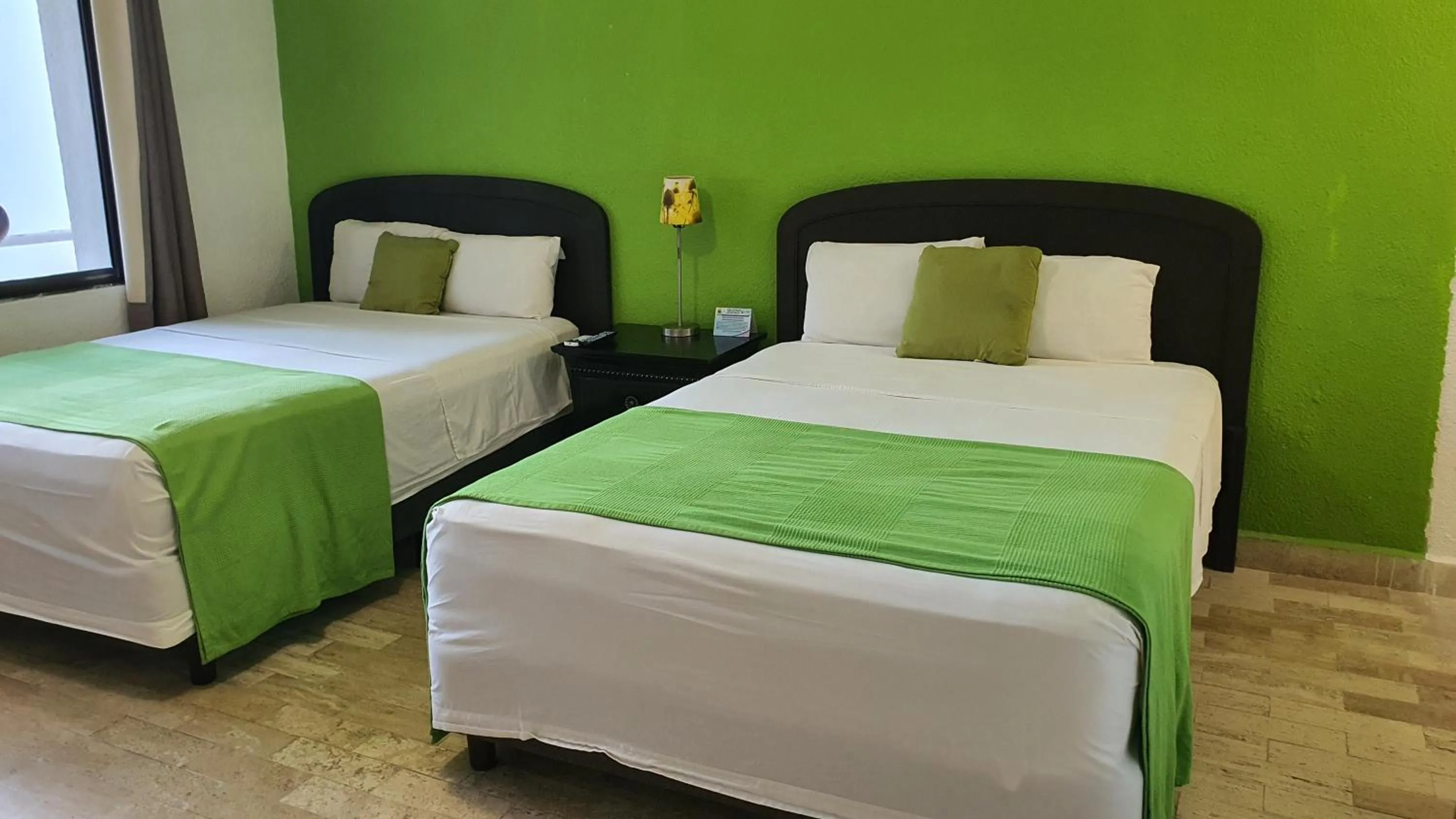 Bed in Nirvana Hotel - Cancun Hotel Zone