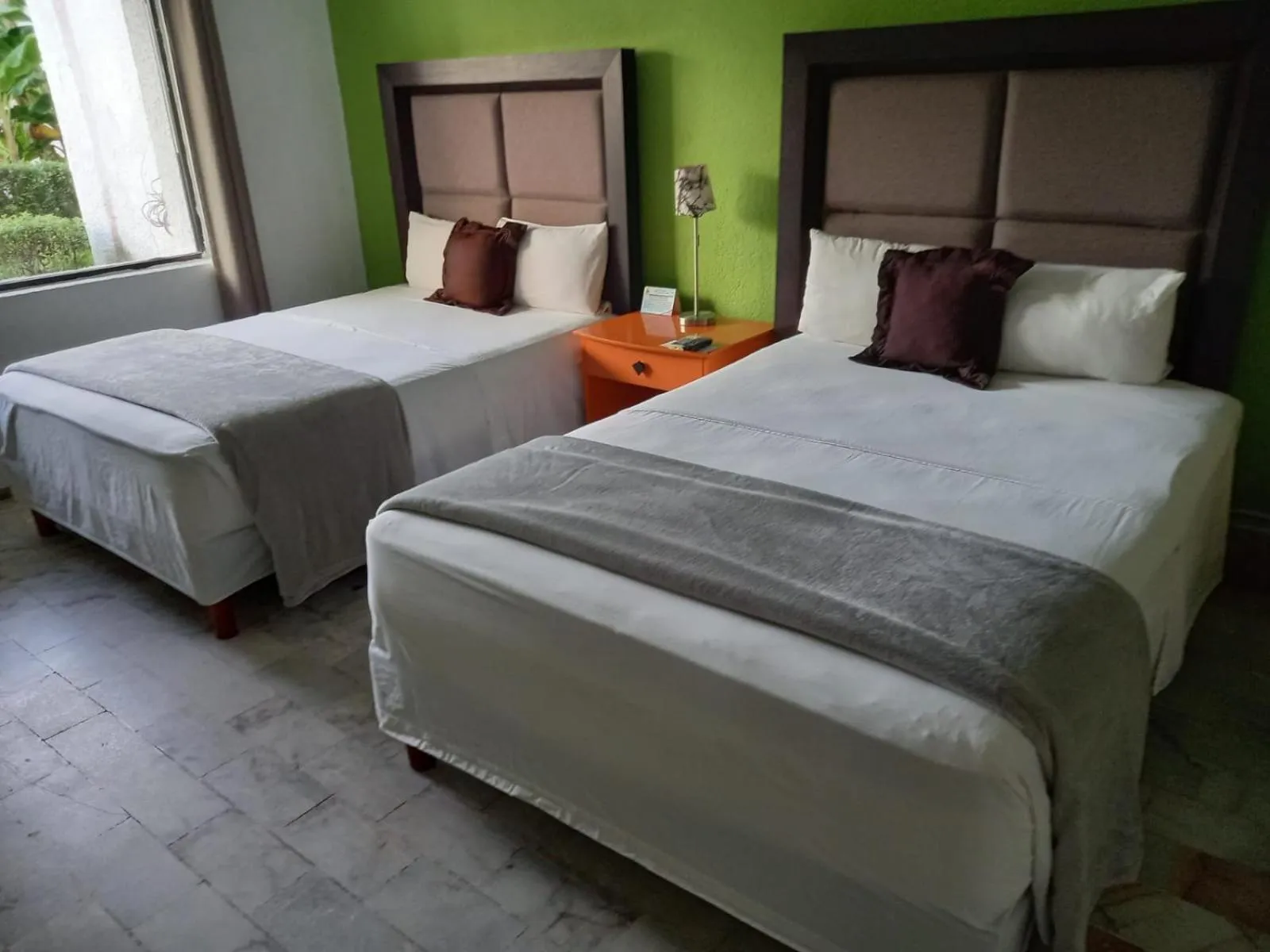 Bed in Nirvana Hotel - Cancun Hotel Zone