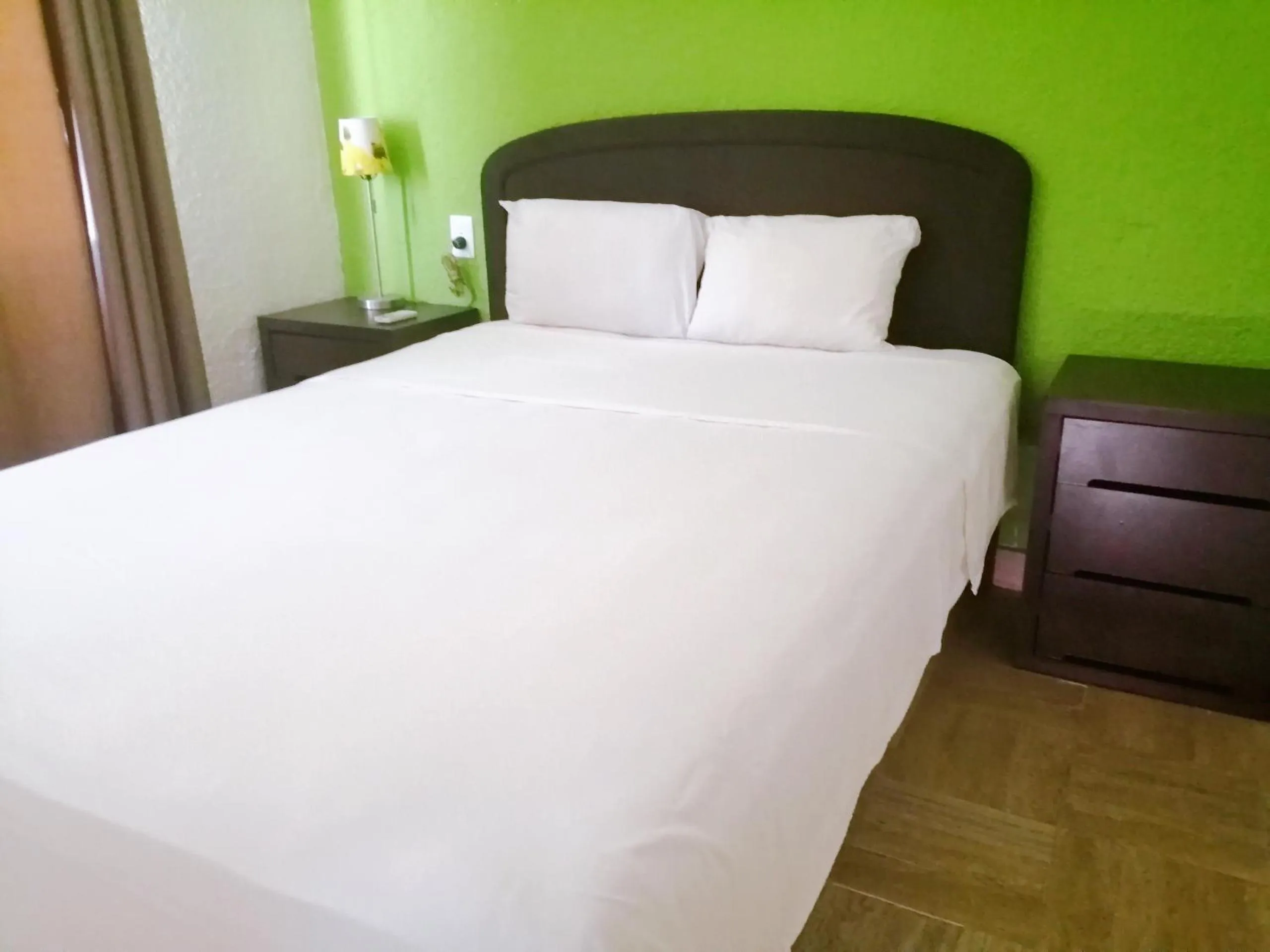 Photo of the whole room, Bed in Nirvana Hotel - Cancun Hotel Zone