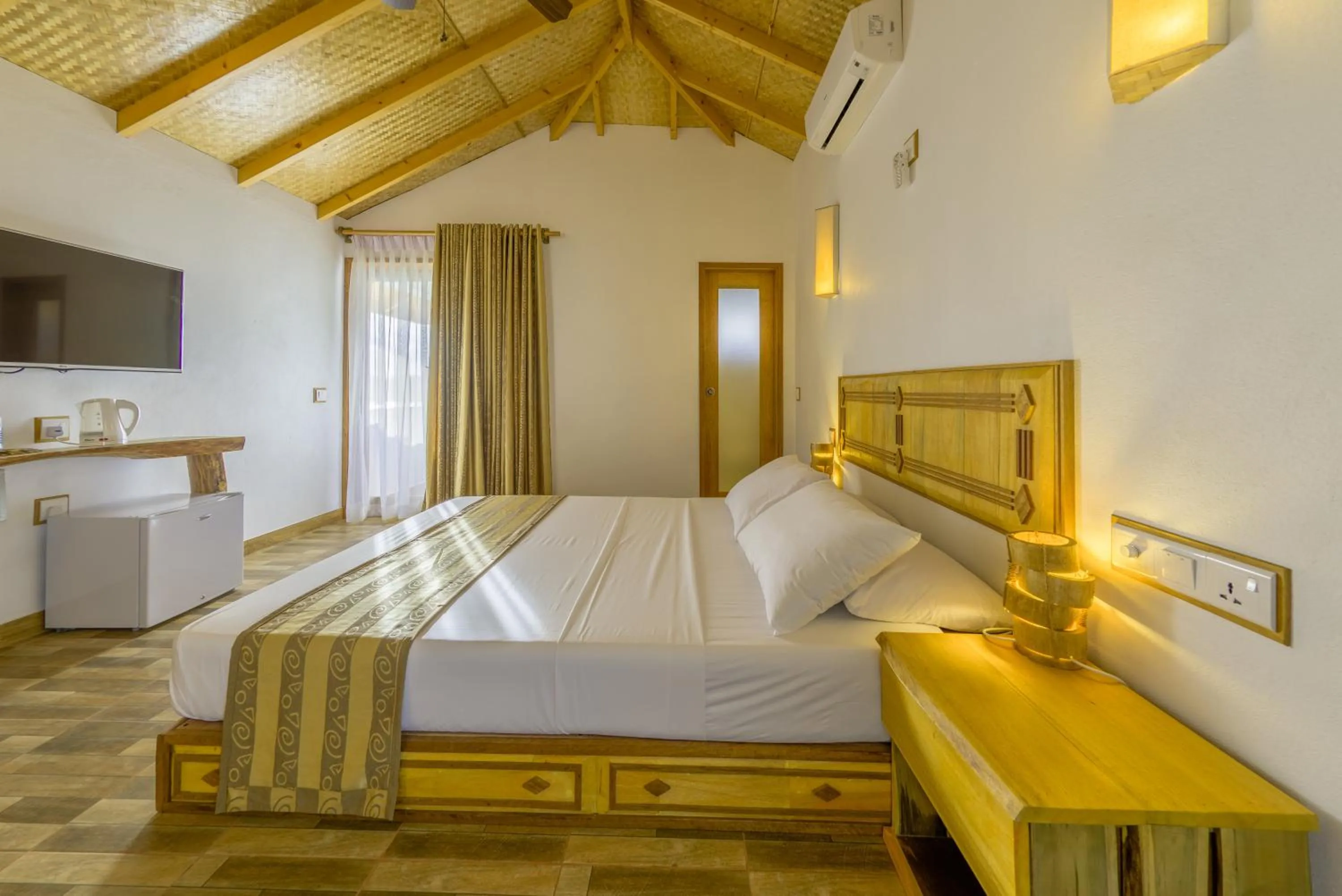 Bed in Ameera Maldives