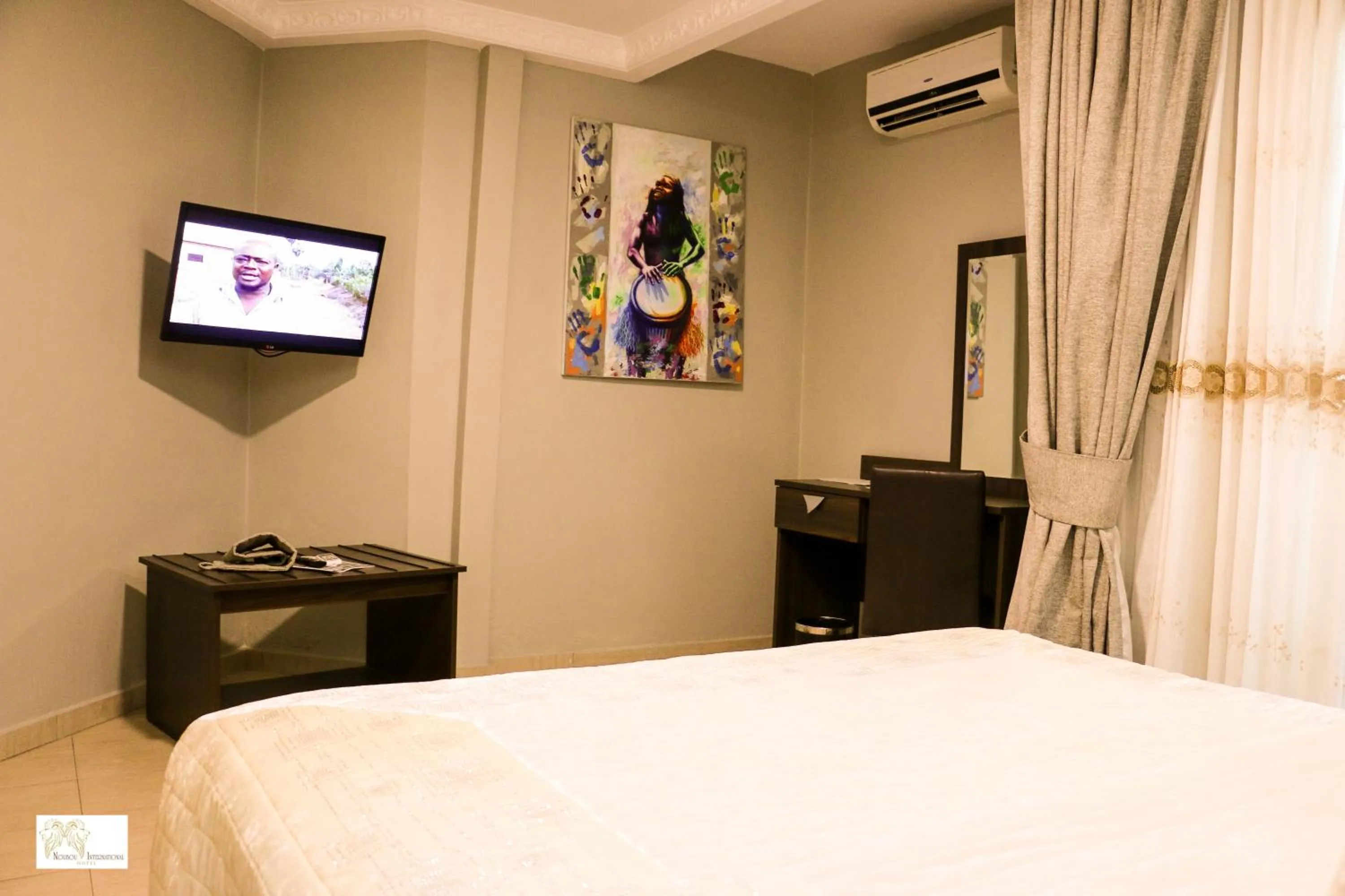 TV and multimedia in Noubou International Hotel