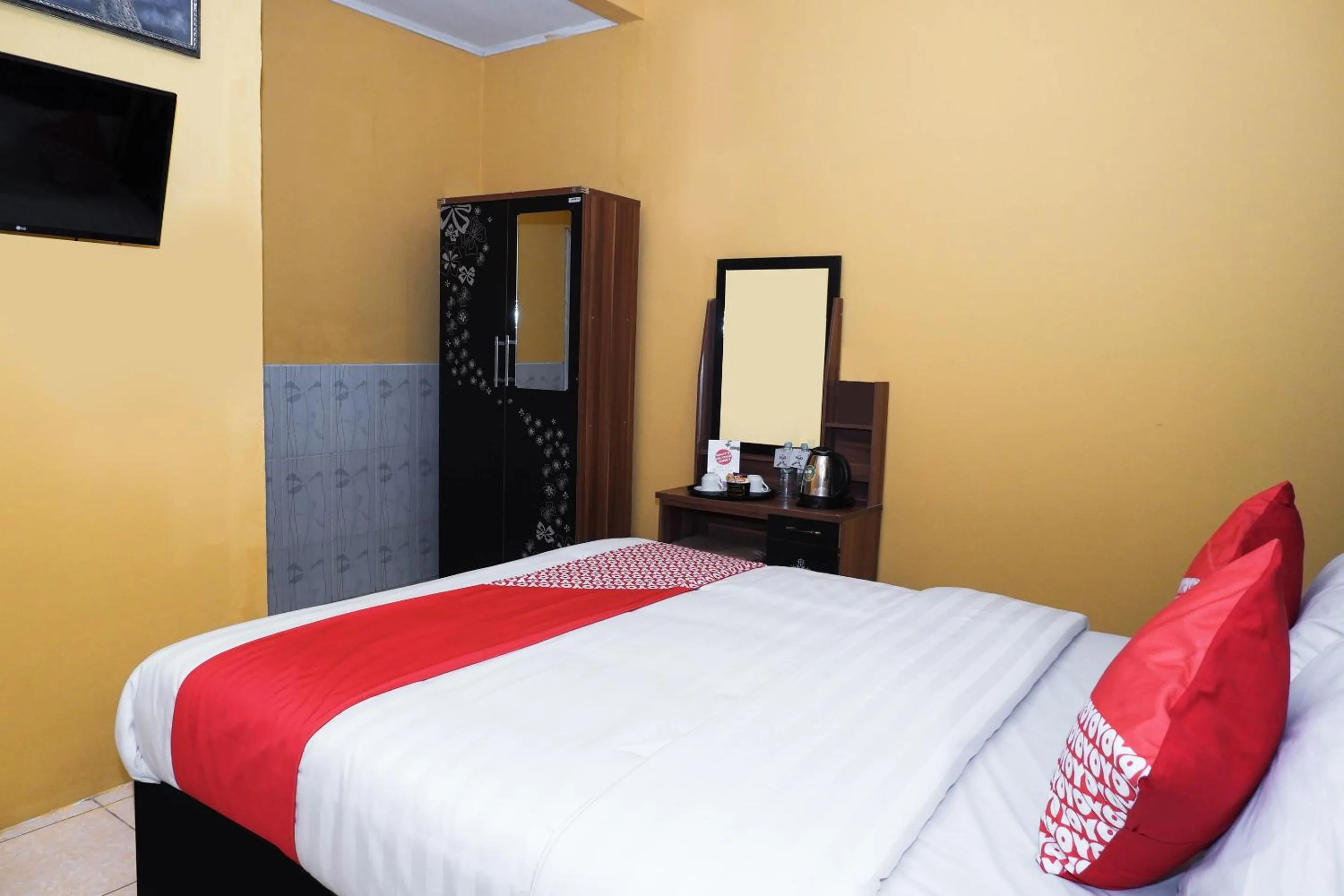Bedroom in Super OYO 598 Udan Mas Guesthouse& Gallery