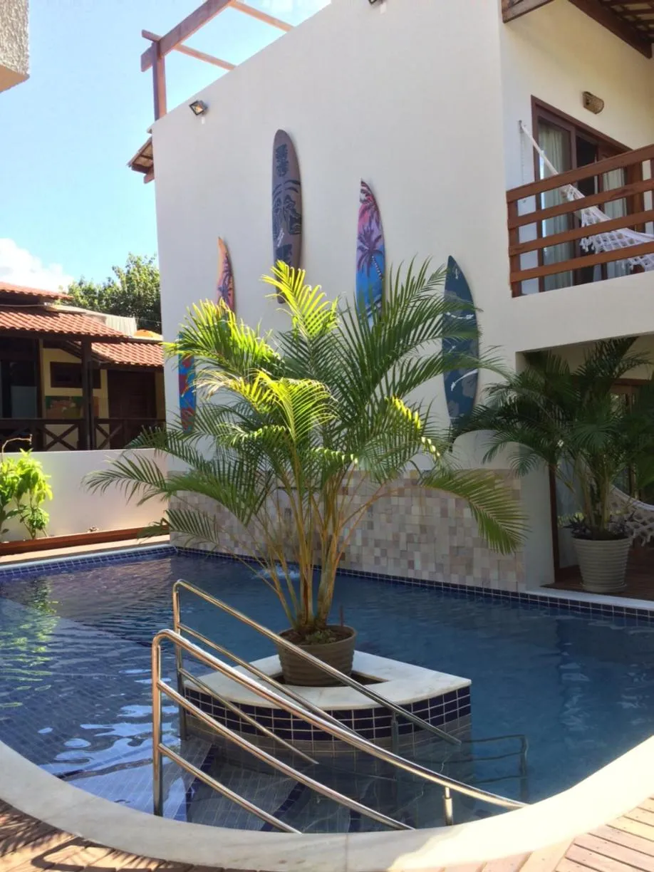 Swimming pool in Pousada Waikiki Boutique