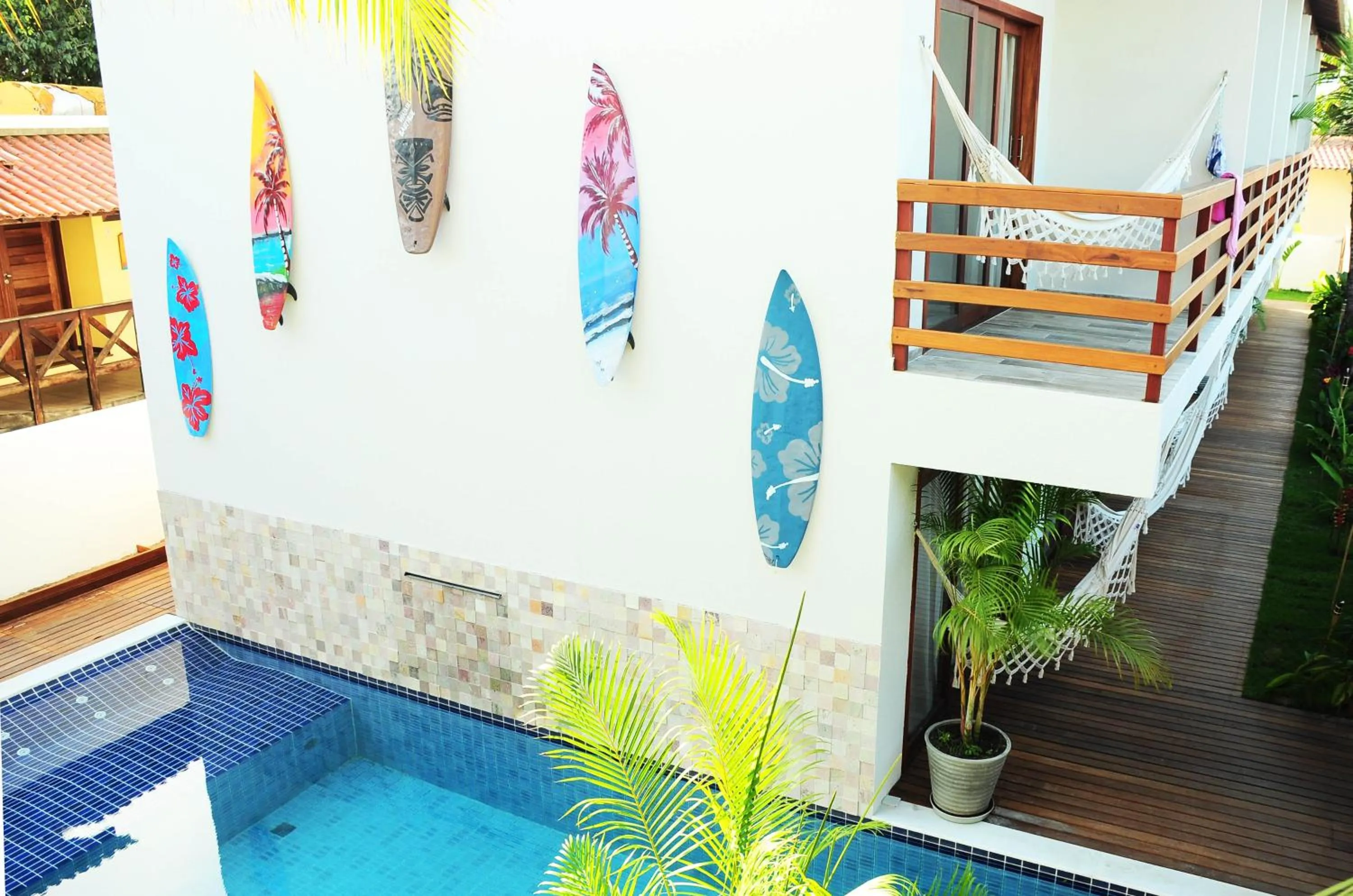 Swimming pool in Pousada Waikiki Boutique