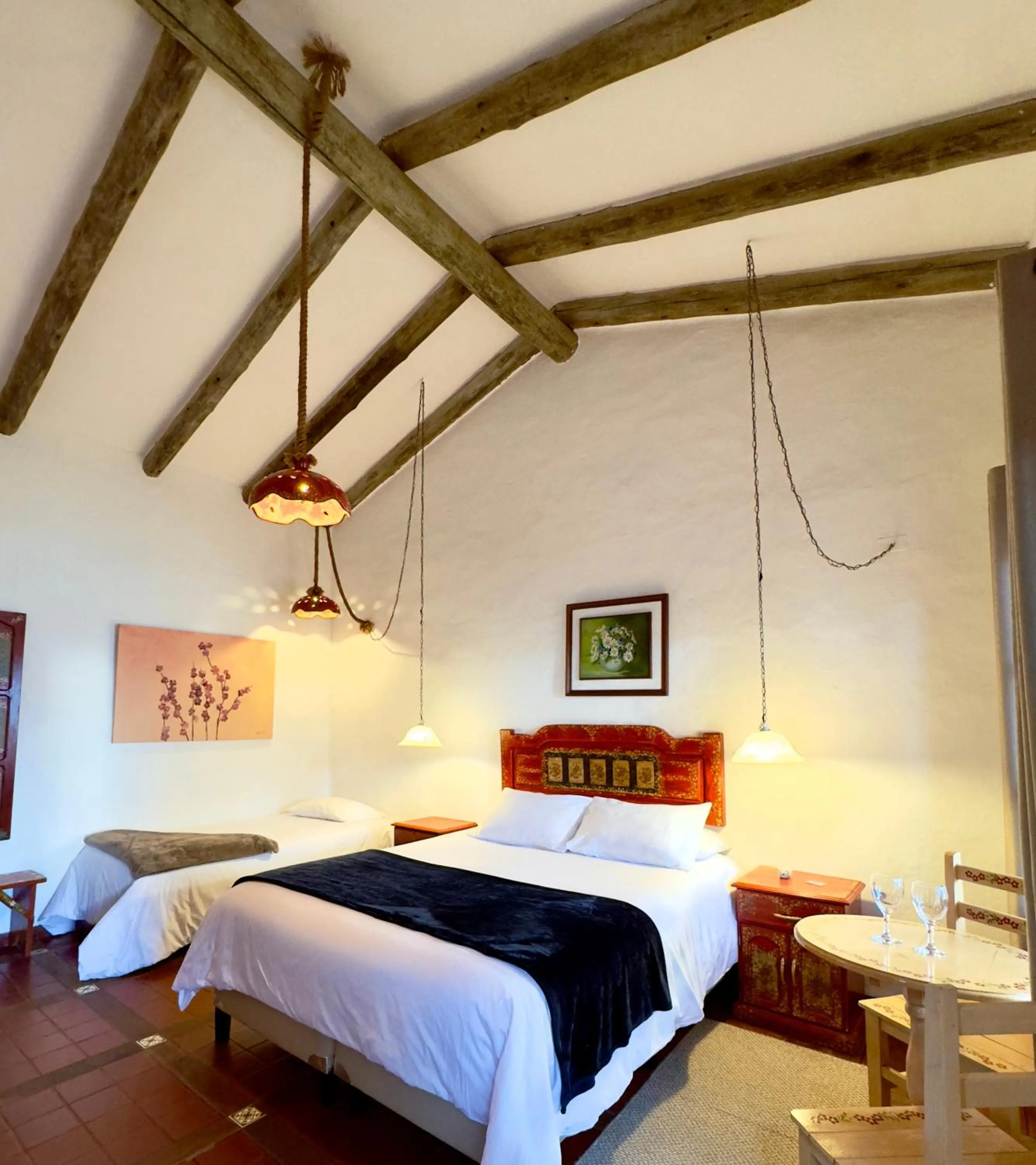 Bed in El Pueblito Hotel Boutique
