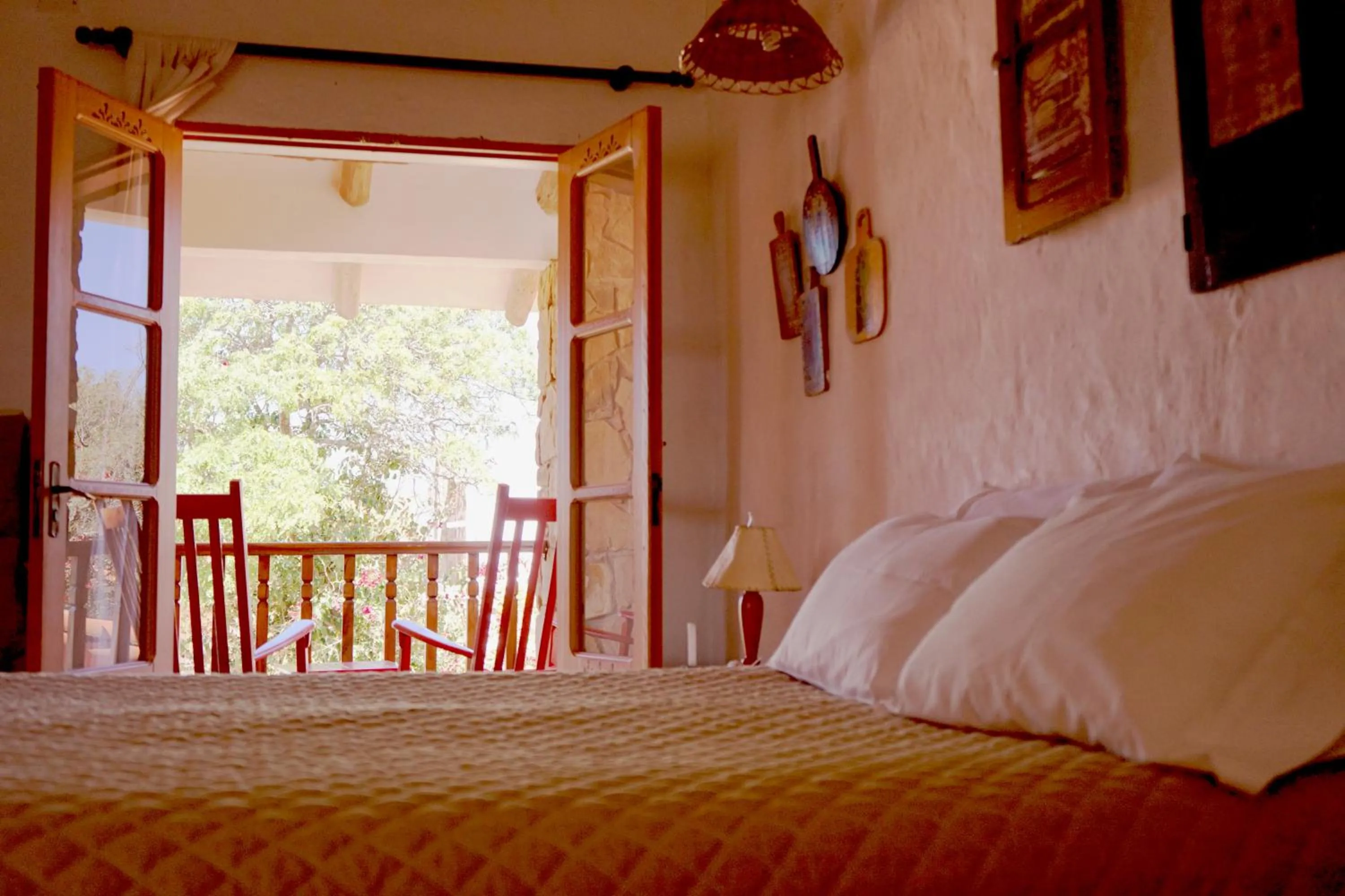 Bed in El Pueblito Hotel Boutique