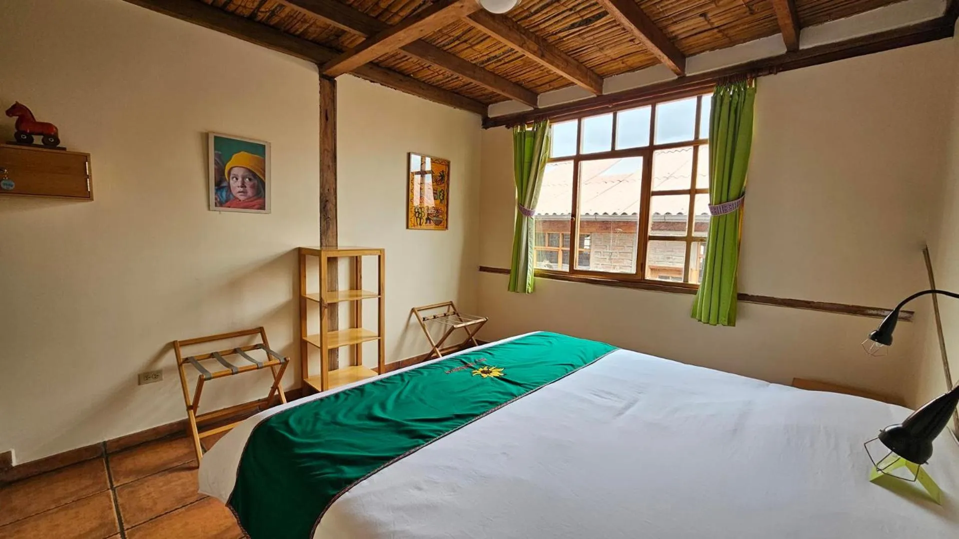 Bed in Inti Sisa Art Guesthouse