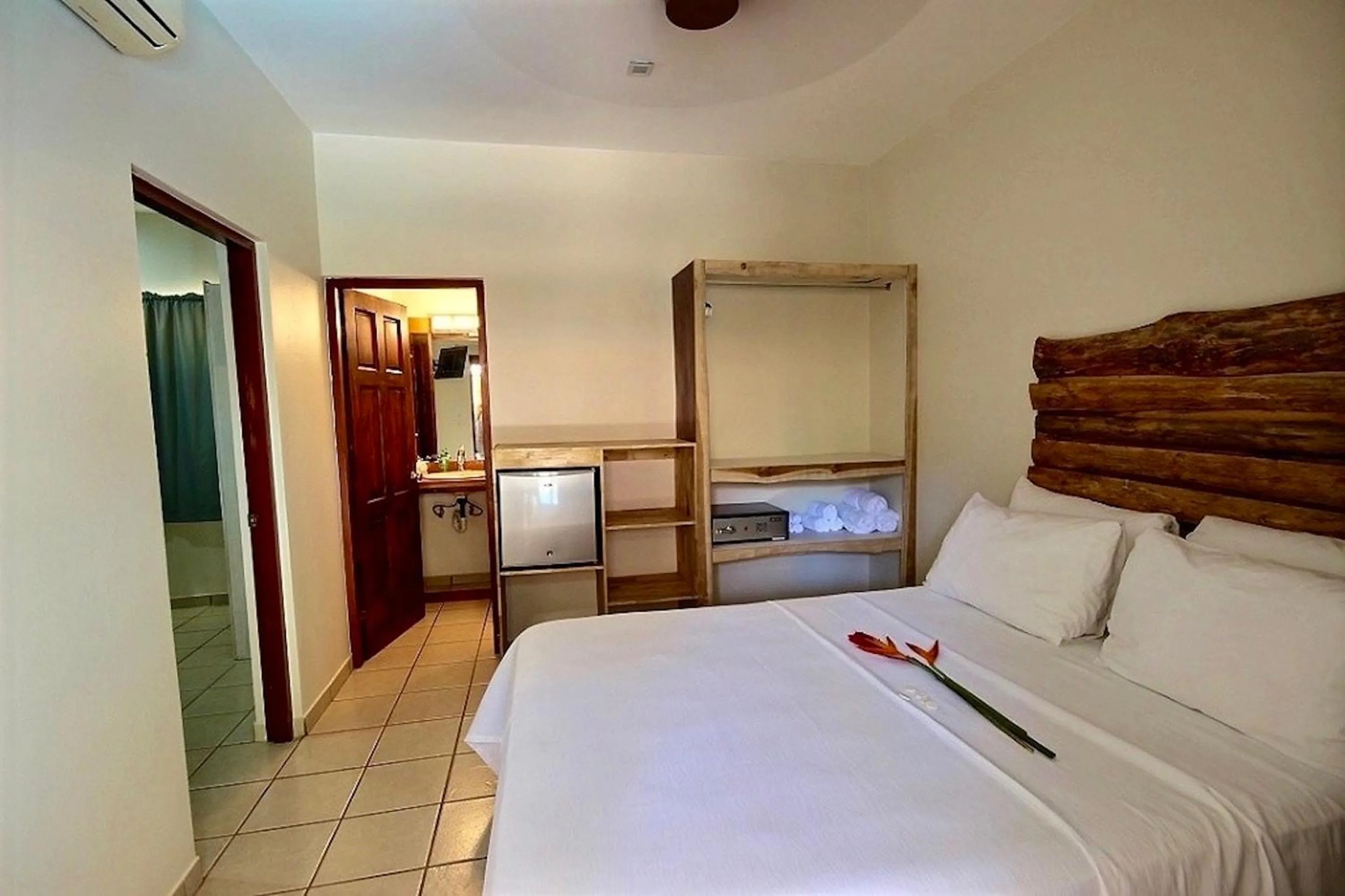 Bed in Ten North Tamarindo Beach Hotel