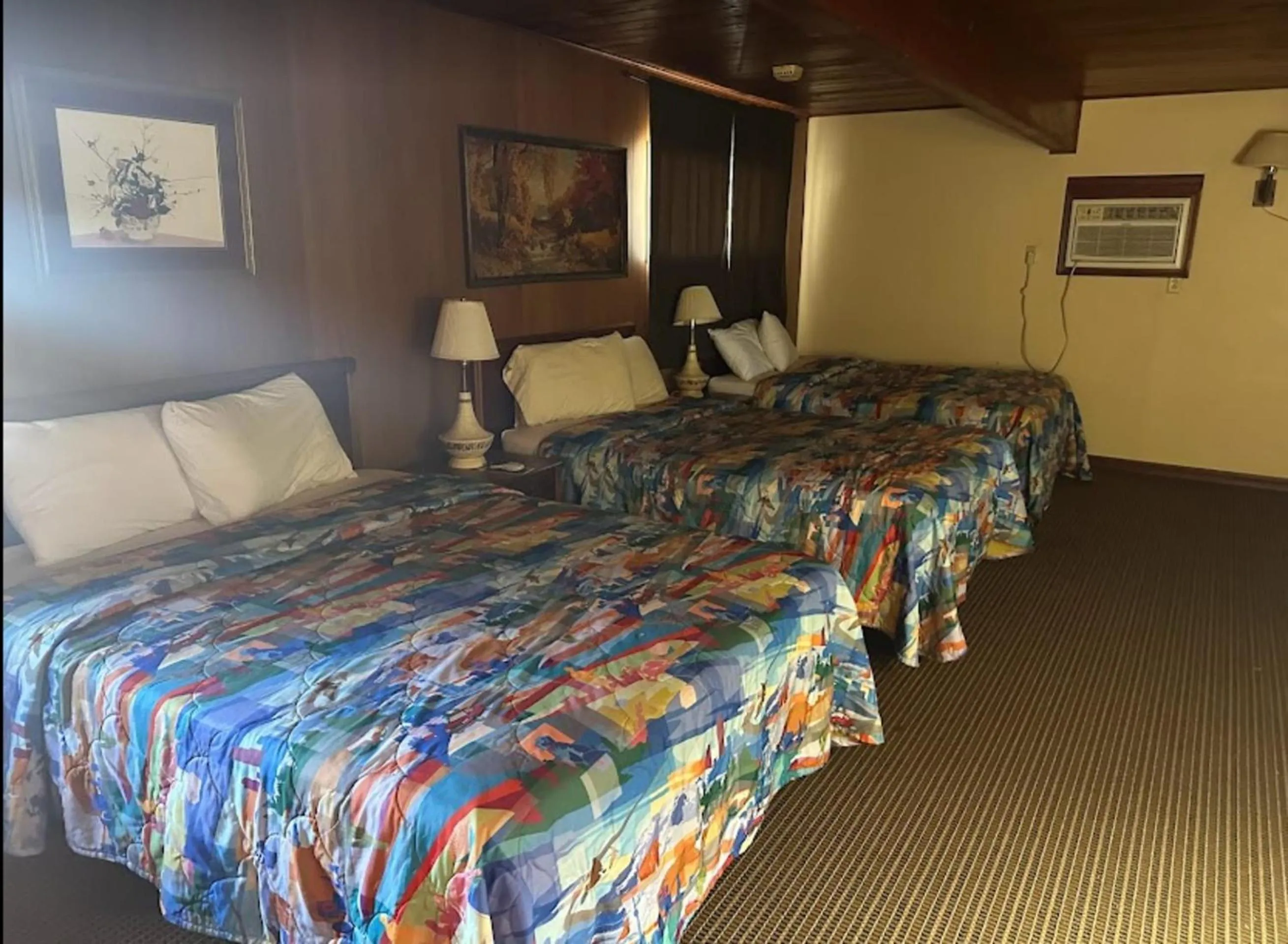 Bedroom, Bed in Love Hotels Western Holiday by OYO at Harlan Lake NE