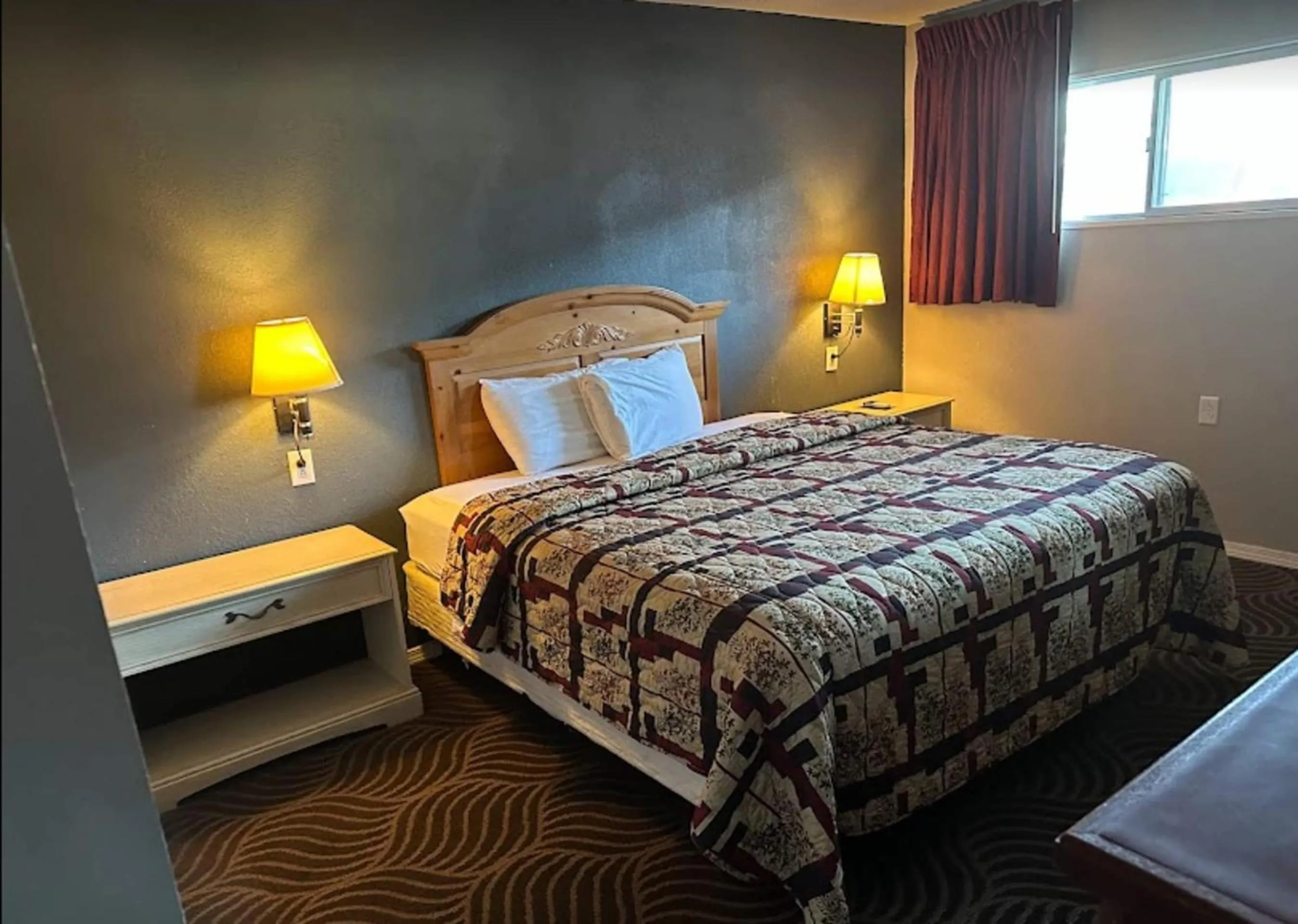 Bedroom, Bed in Love Hotels Western Holiday by OYO at Harlan Lake NE