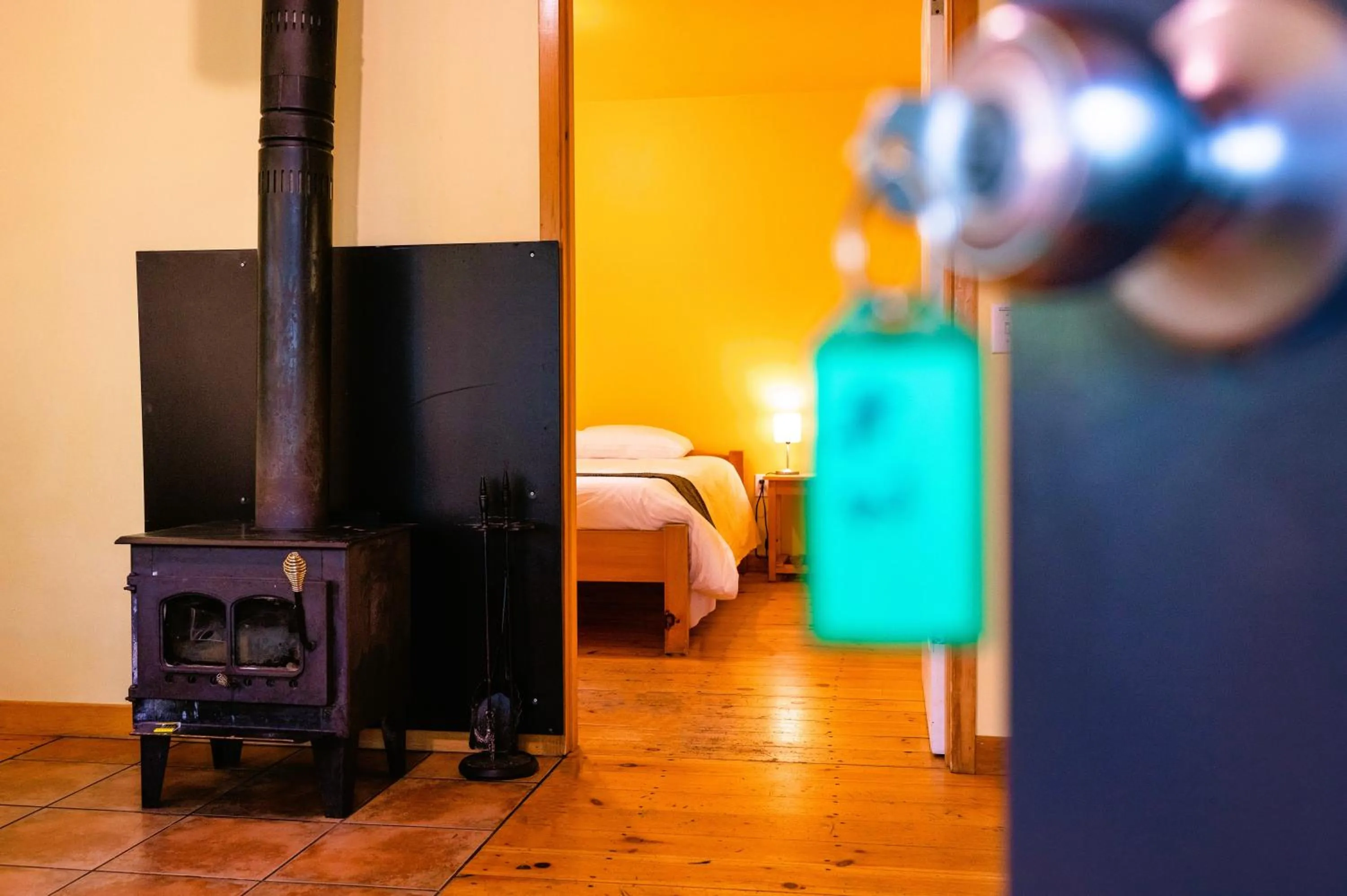 flat iron, Bed in Mersey River Chalets a nature retreat