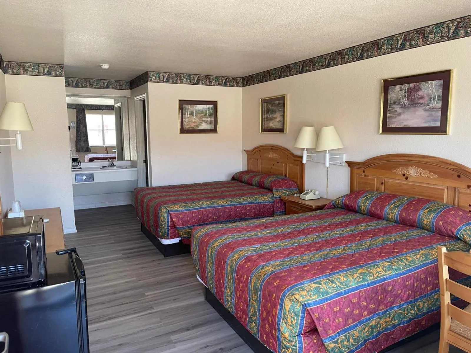 Bedroom, Bed in Lakeside inn & suites by OYO Mathis I 37