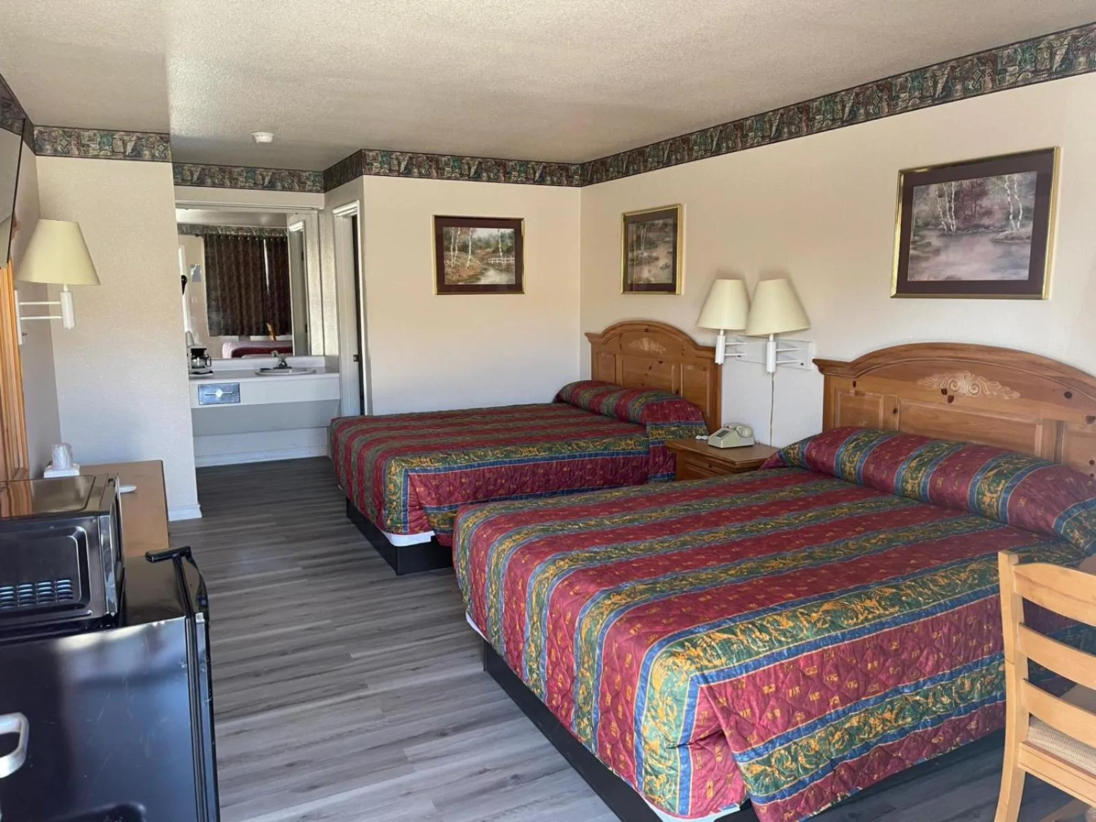 Bedroom, Bed in Lakeside inn & suites by OYO Mathis I 37