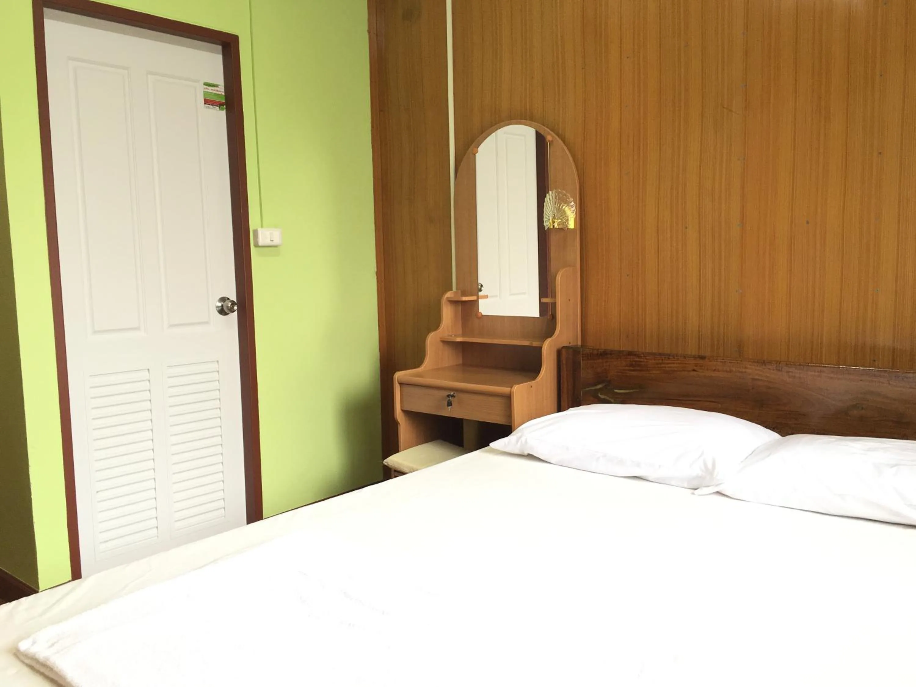 Bed in Baan Suan Kru Kob