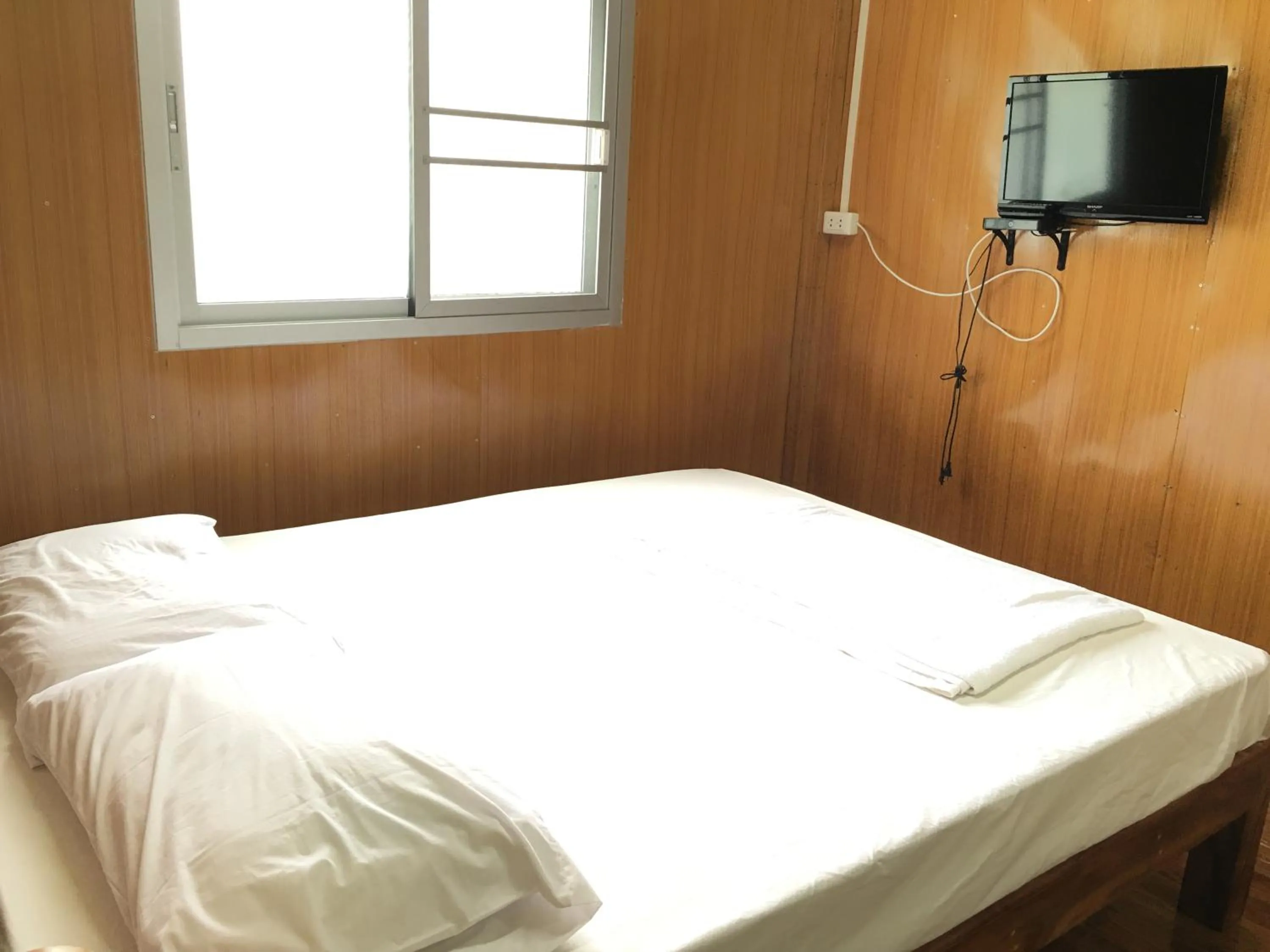 Bed in Baan Suan Kru Kob