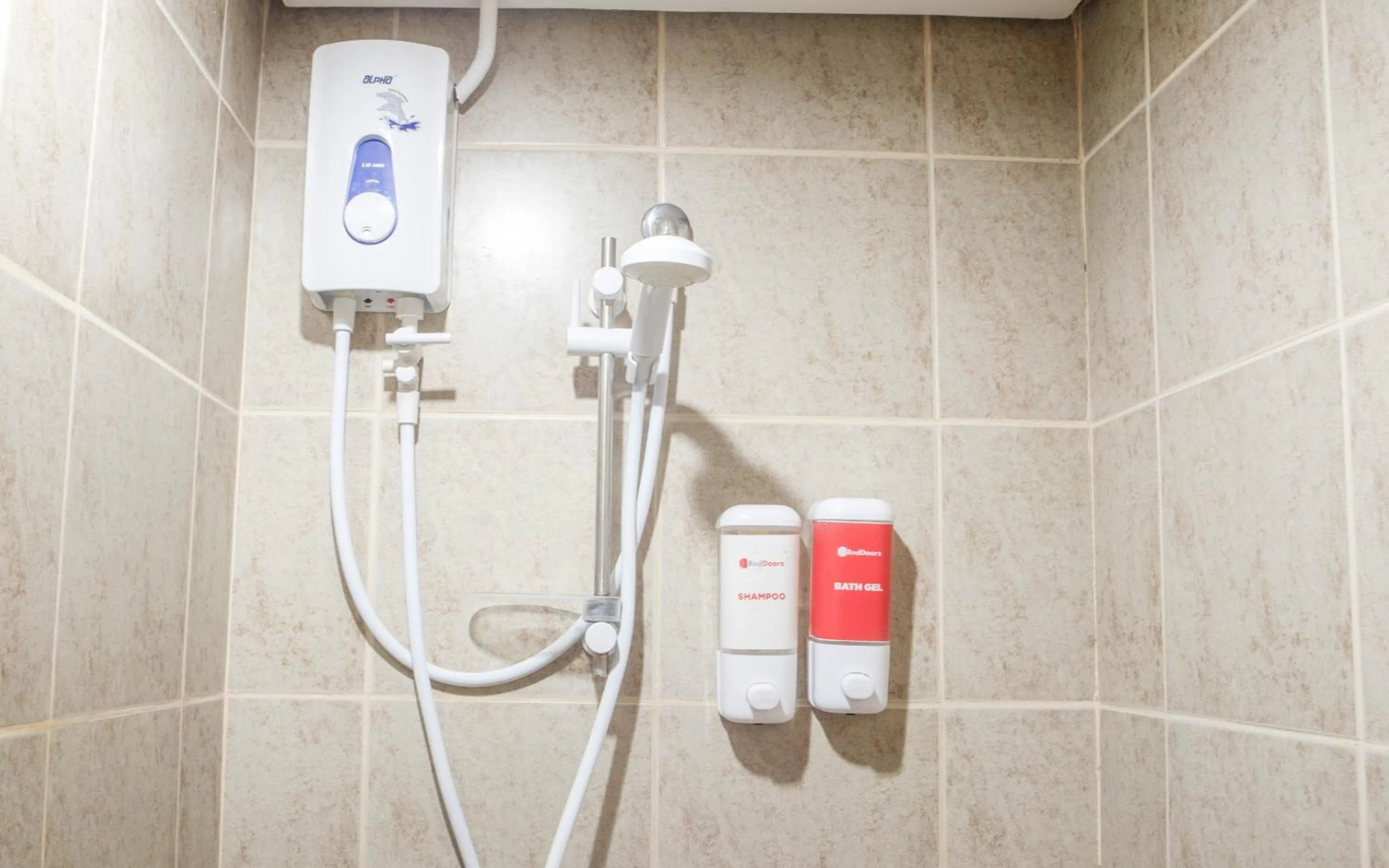 Shower in RedDoorz Plus near Rizal Junction