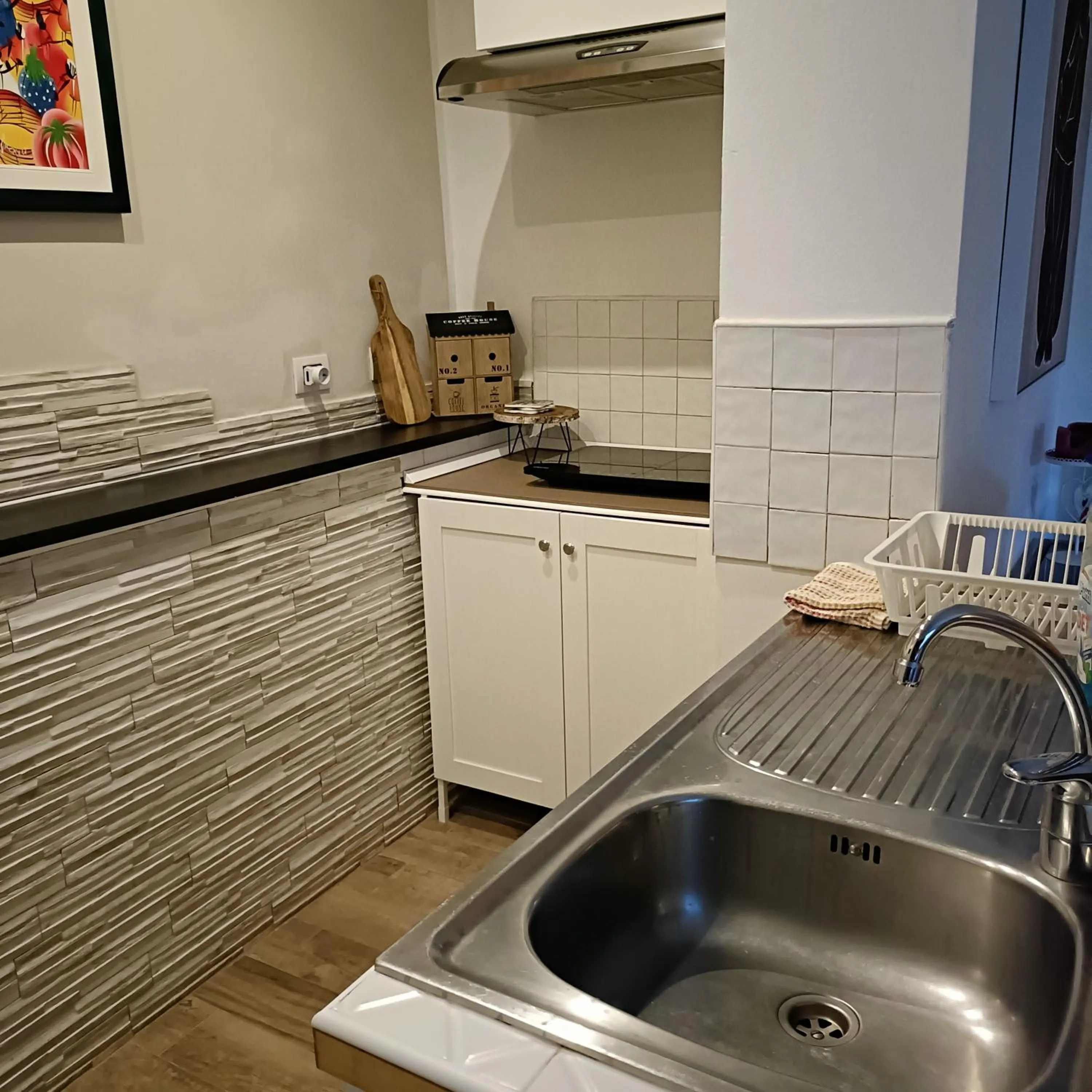 Kitchen or kitchenette in Gian Paul Hotel