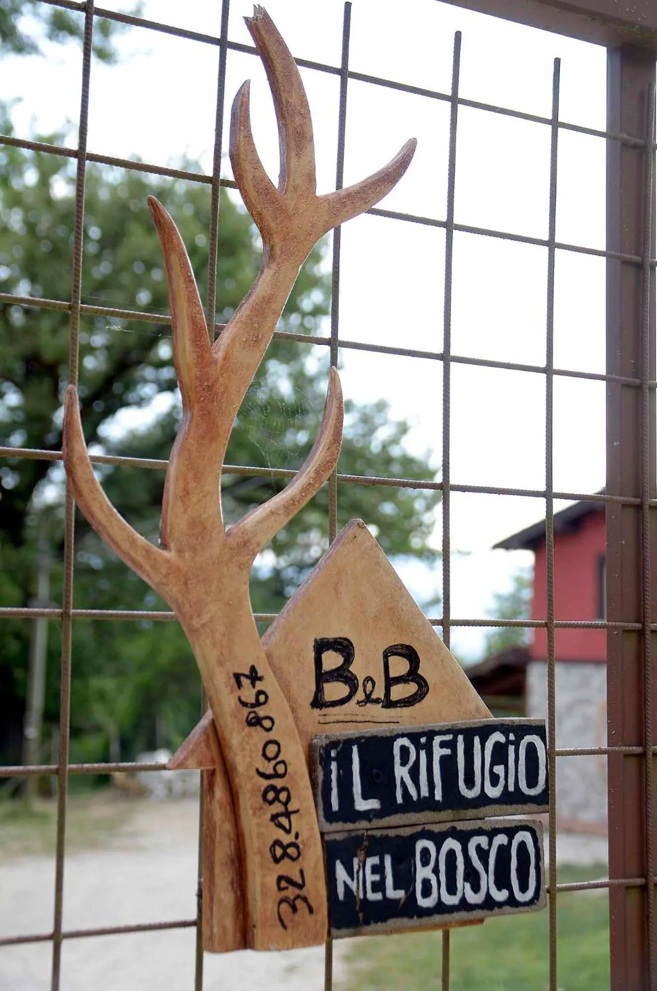 Property logo or sign in Rifugio Nel Bosco