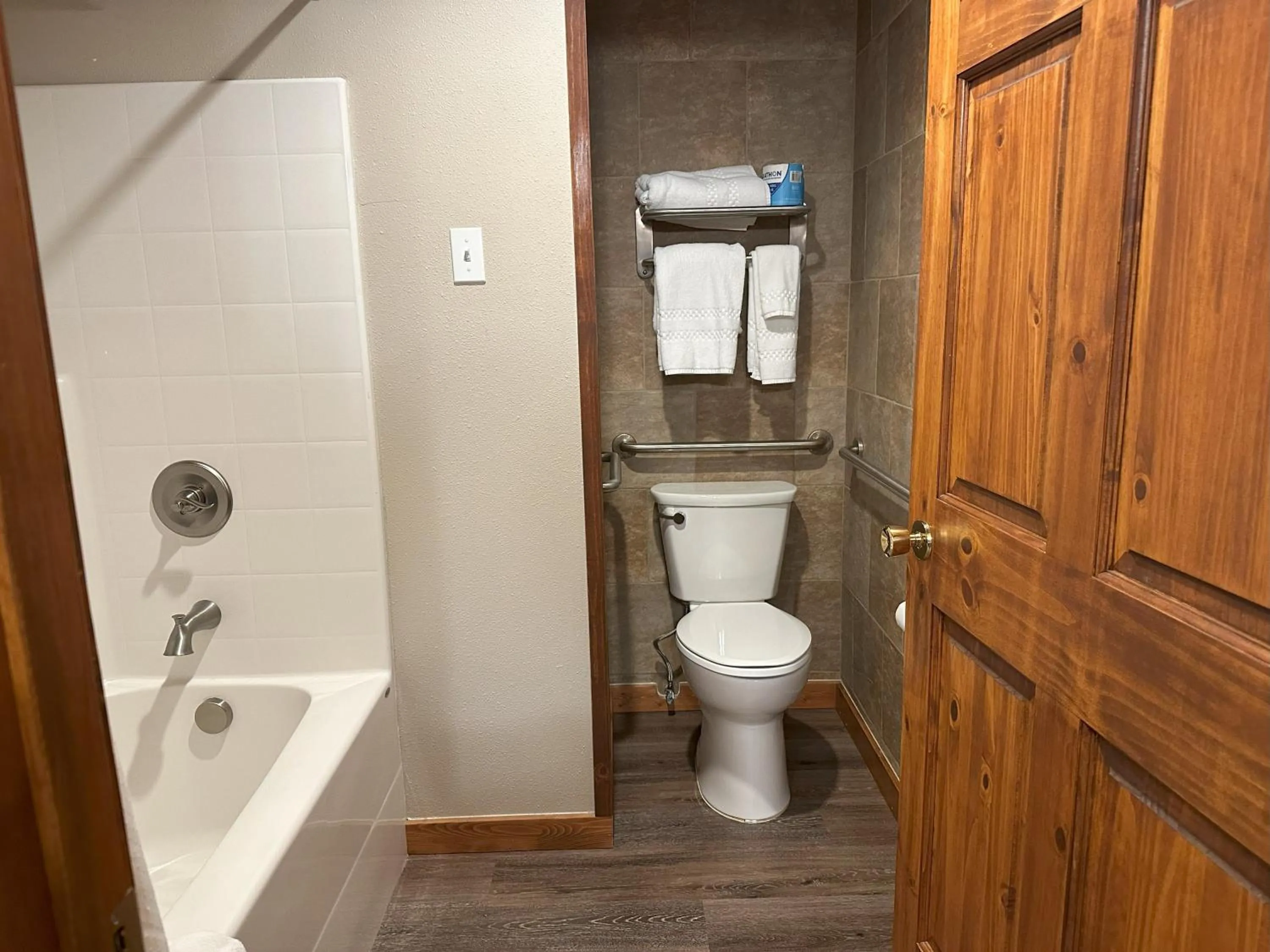 Toilet in Timber Lodge Inn