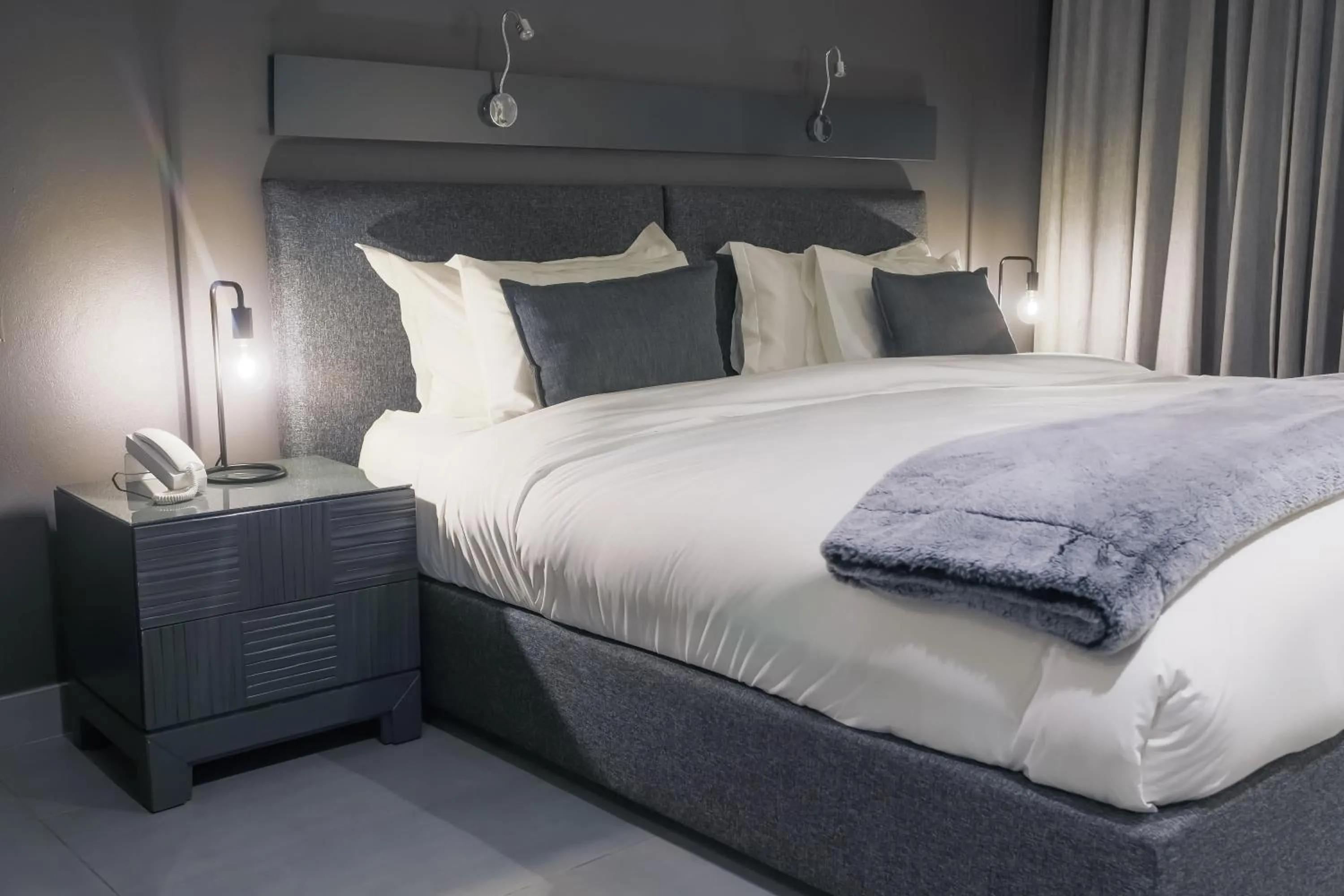 Bed in Atlantic Affair Boutique Hotel