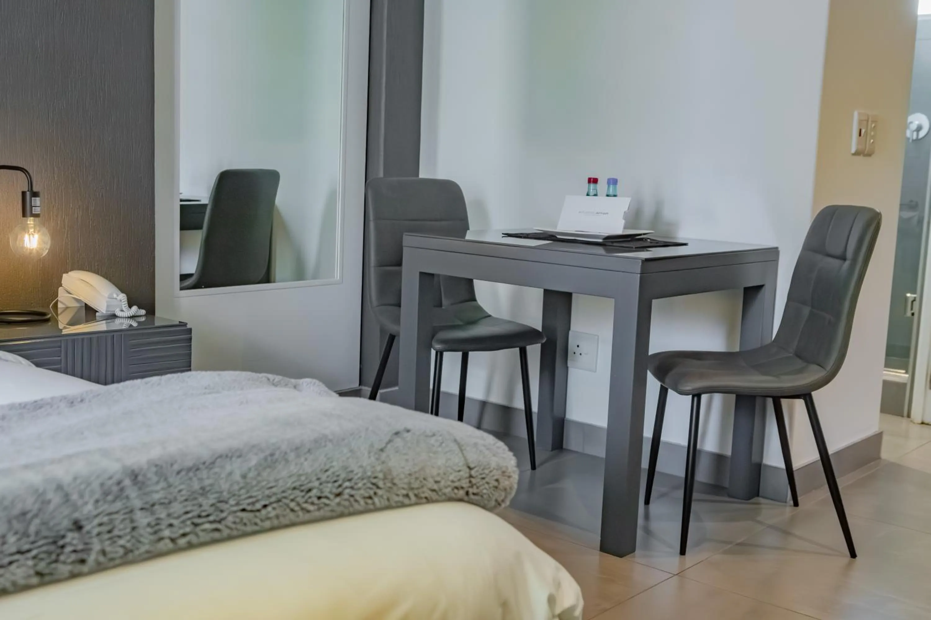 Bed in Atlantic Affair Boutique Hotel