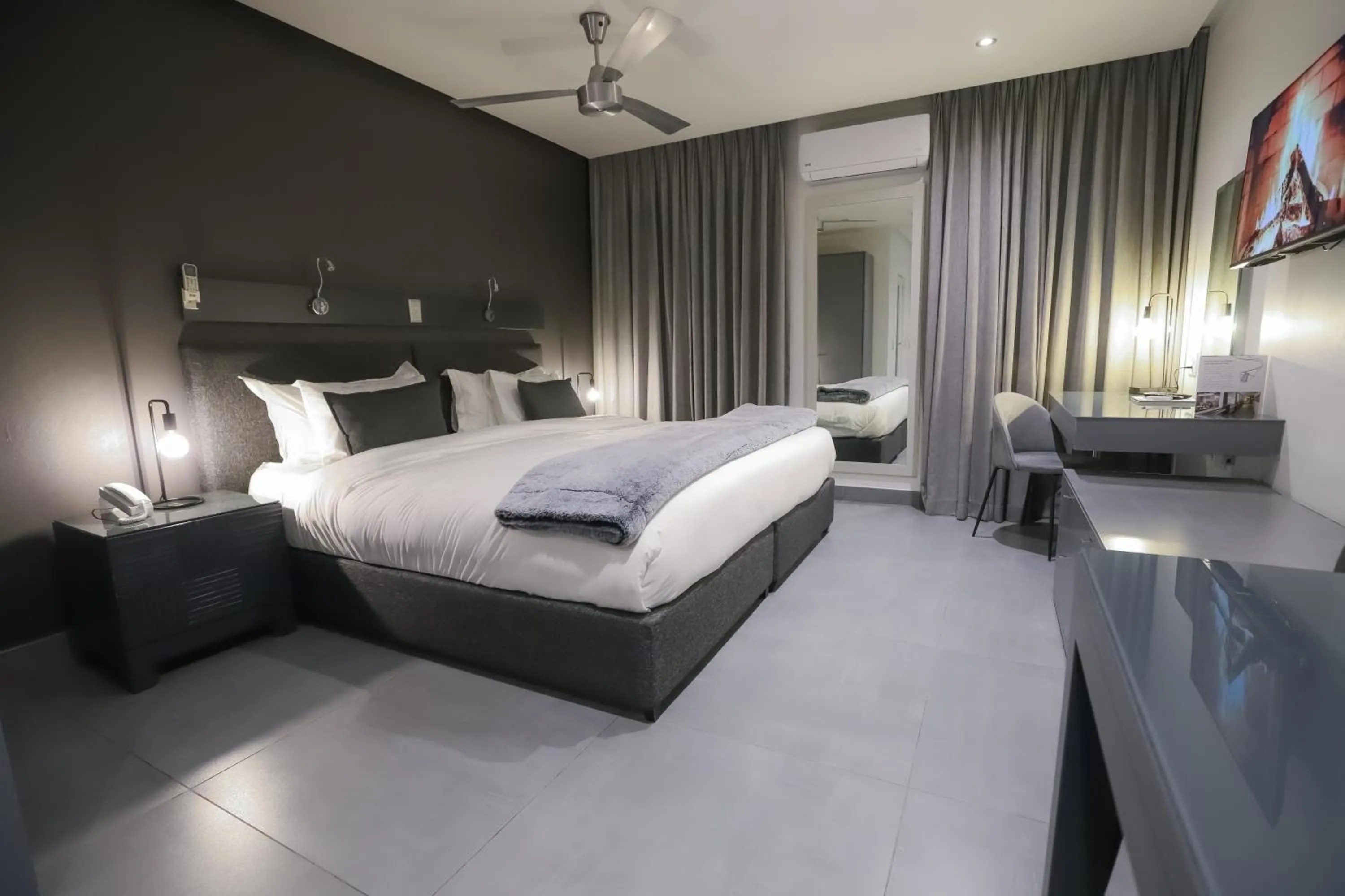 Bed in Atlantic Affair Boutique Hotel