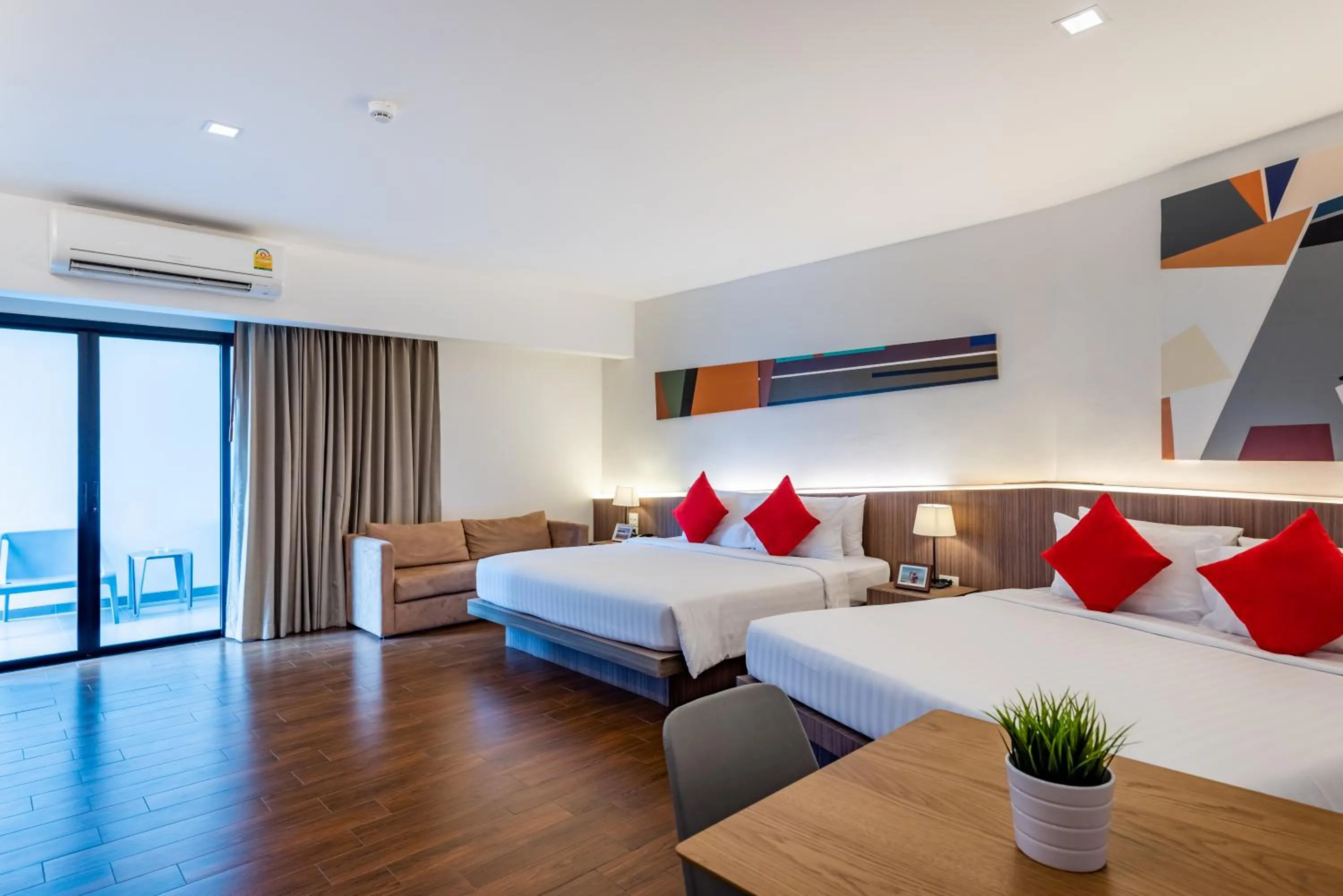 Bed in J Inspired Hotel Pattaya