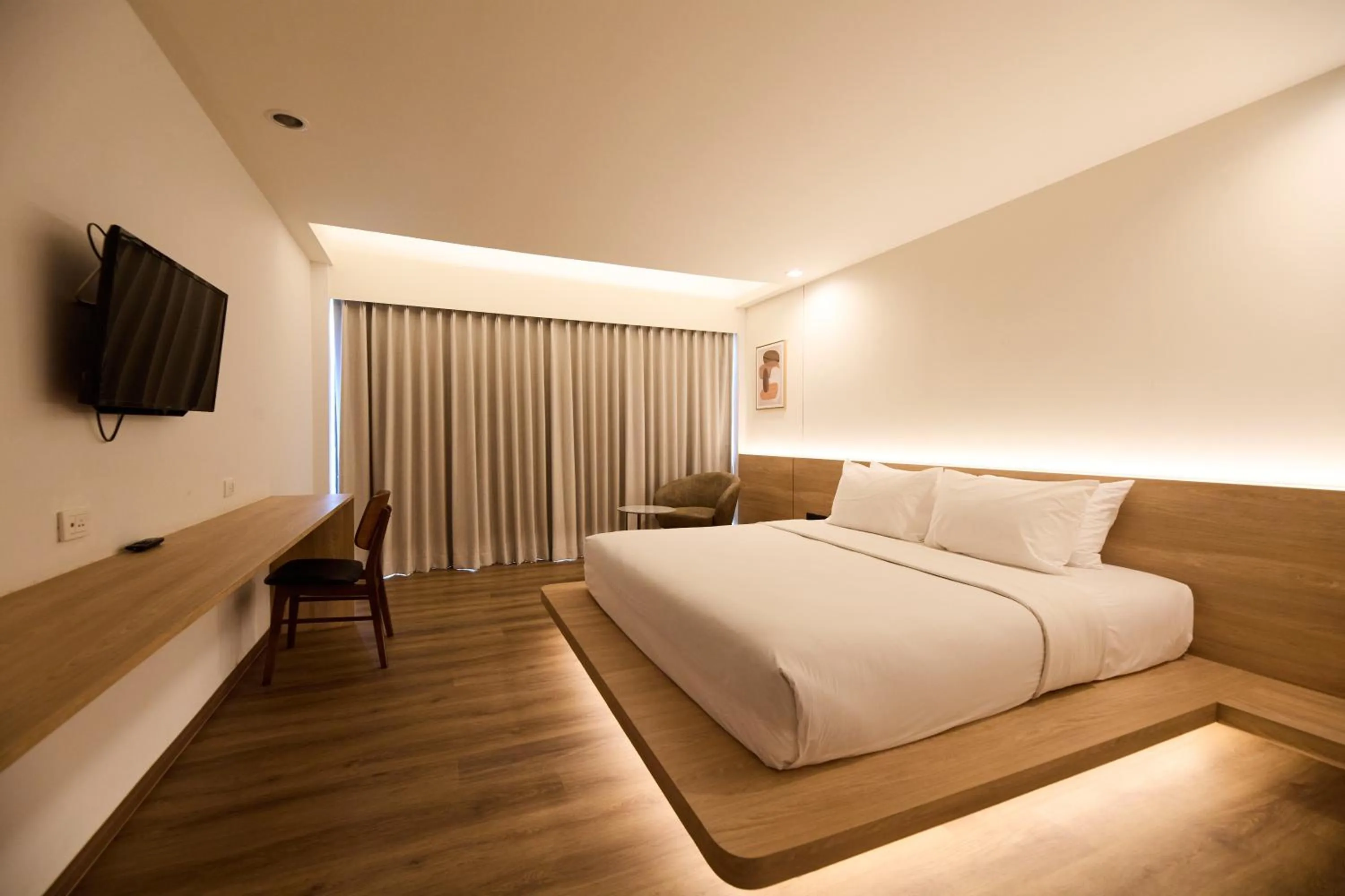Bed in Welcome Plaza Hotel Pattaya