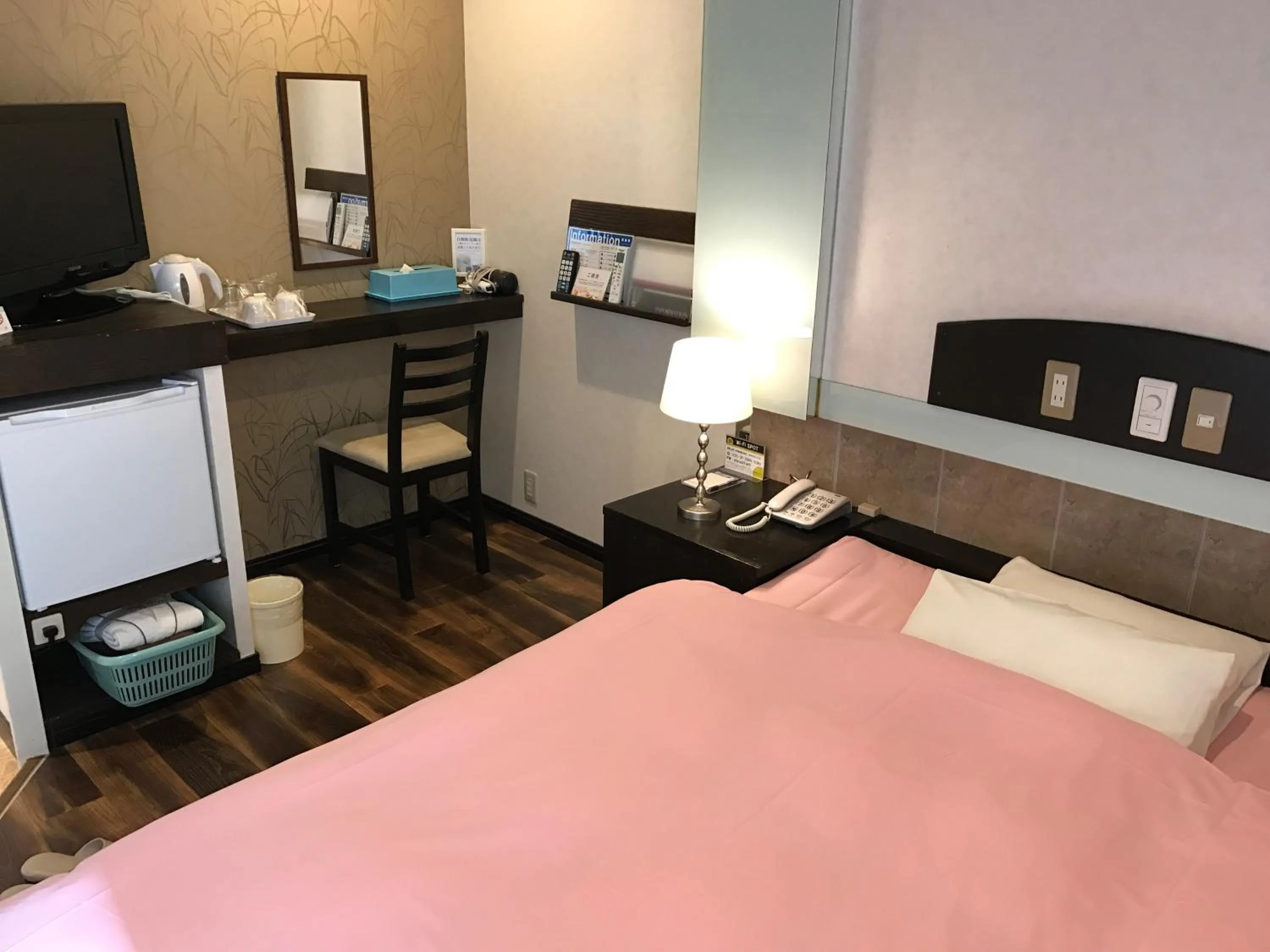 Bed in ビジネスインホテルプラザ21大阪京橋