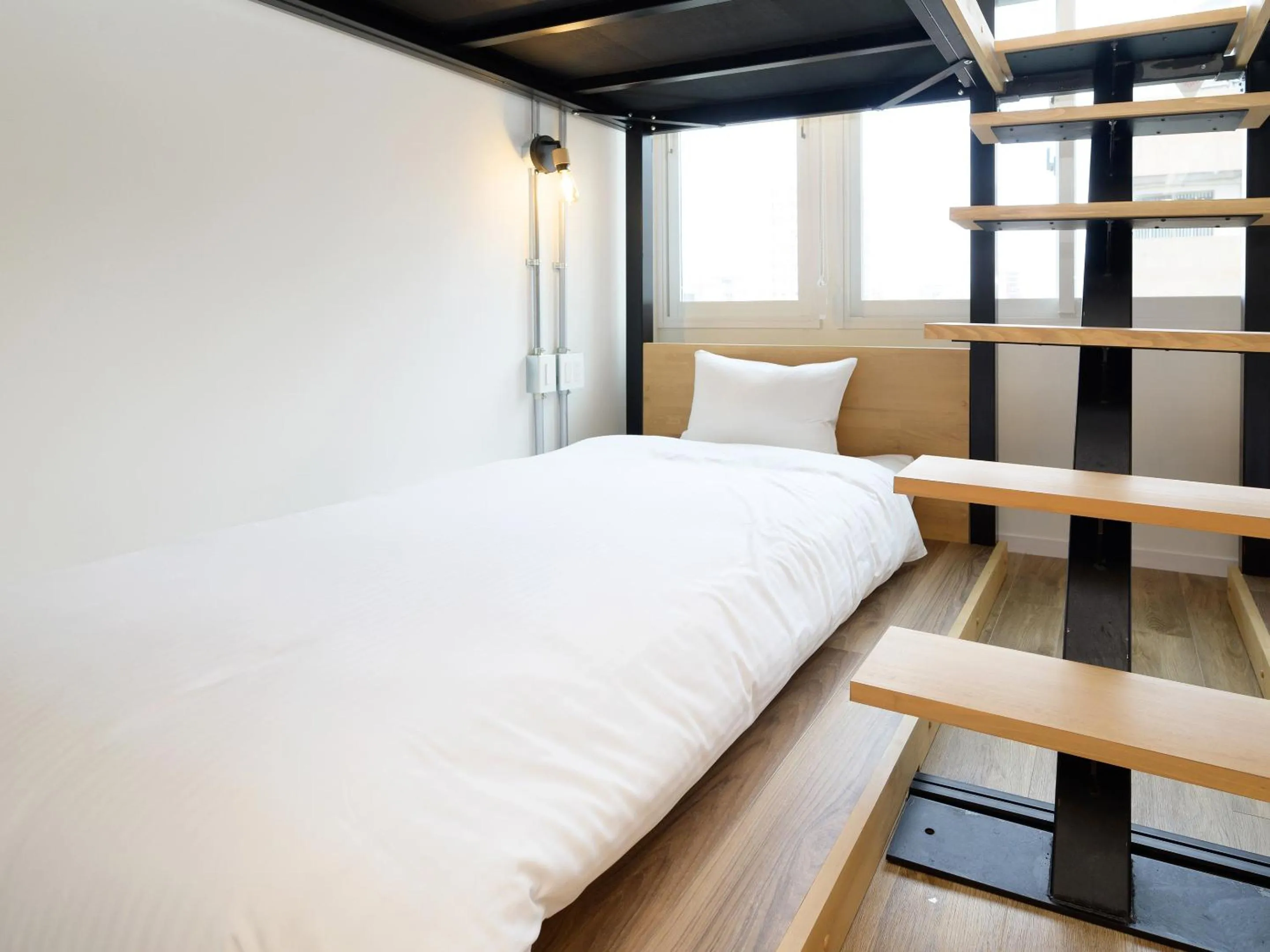 Bed in HOTEL THE CUBE Naha Kokusai Street