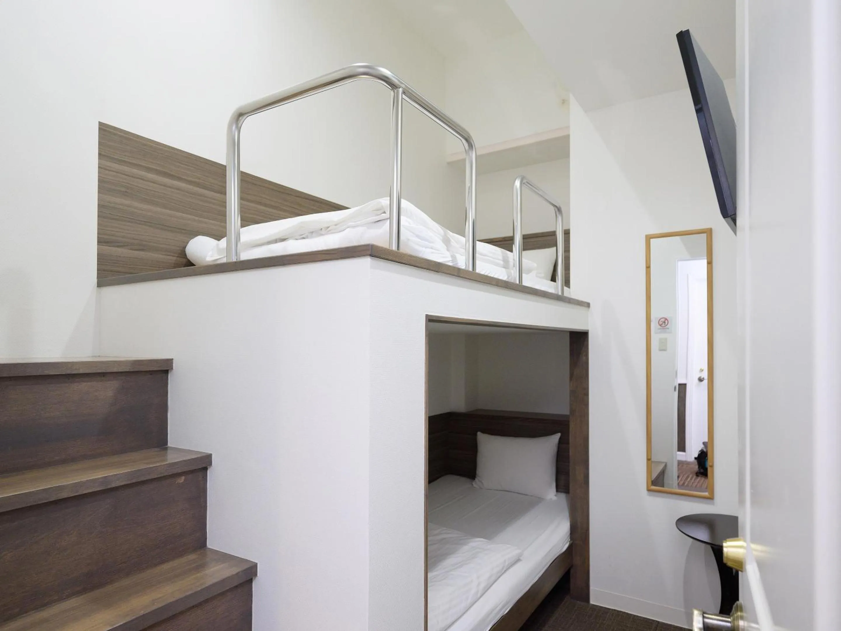 Photo of the whole room, Bed in HOTEL THE CUBE Naha Kokusai Street